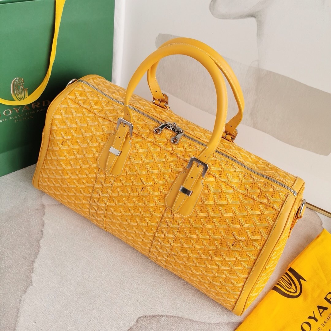 Goyard Boston 50 duffle bag in yellow Goyardine canvas with leather trim