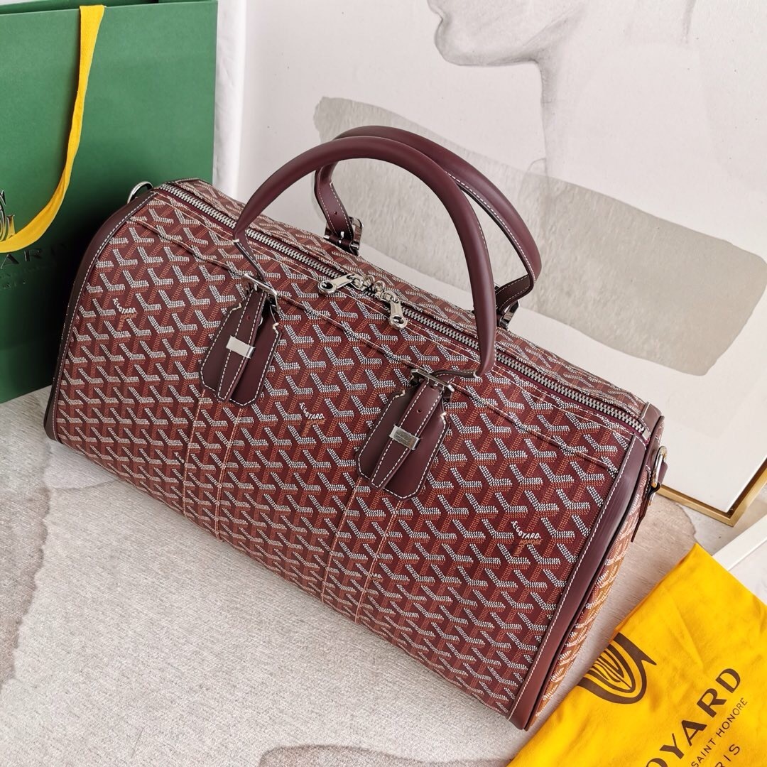 Goyard Boston bag, a travel bag made from the brand's iconic Goyardine canvas