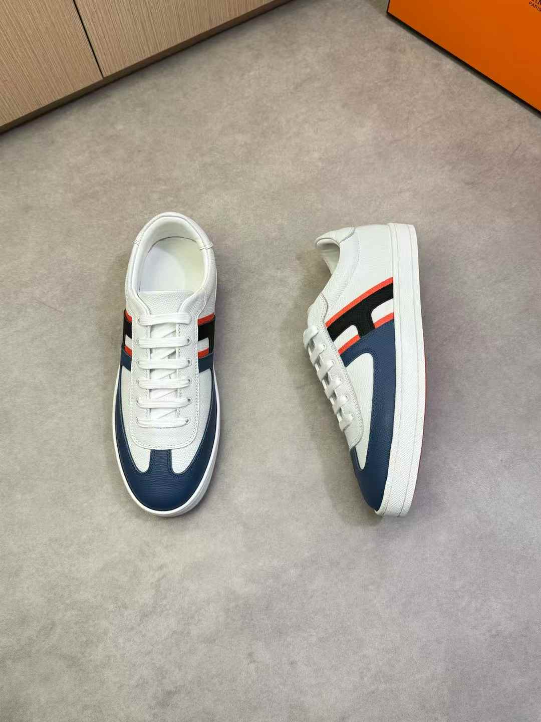 Hermès Boomerang sneaker in white leather with blue and red accents