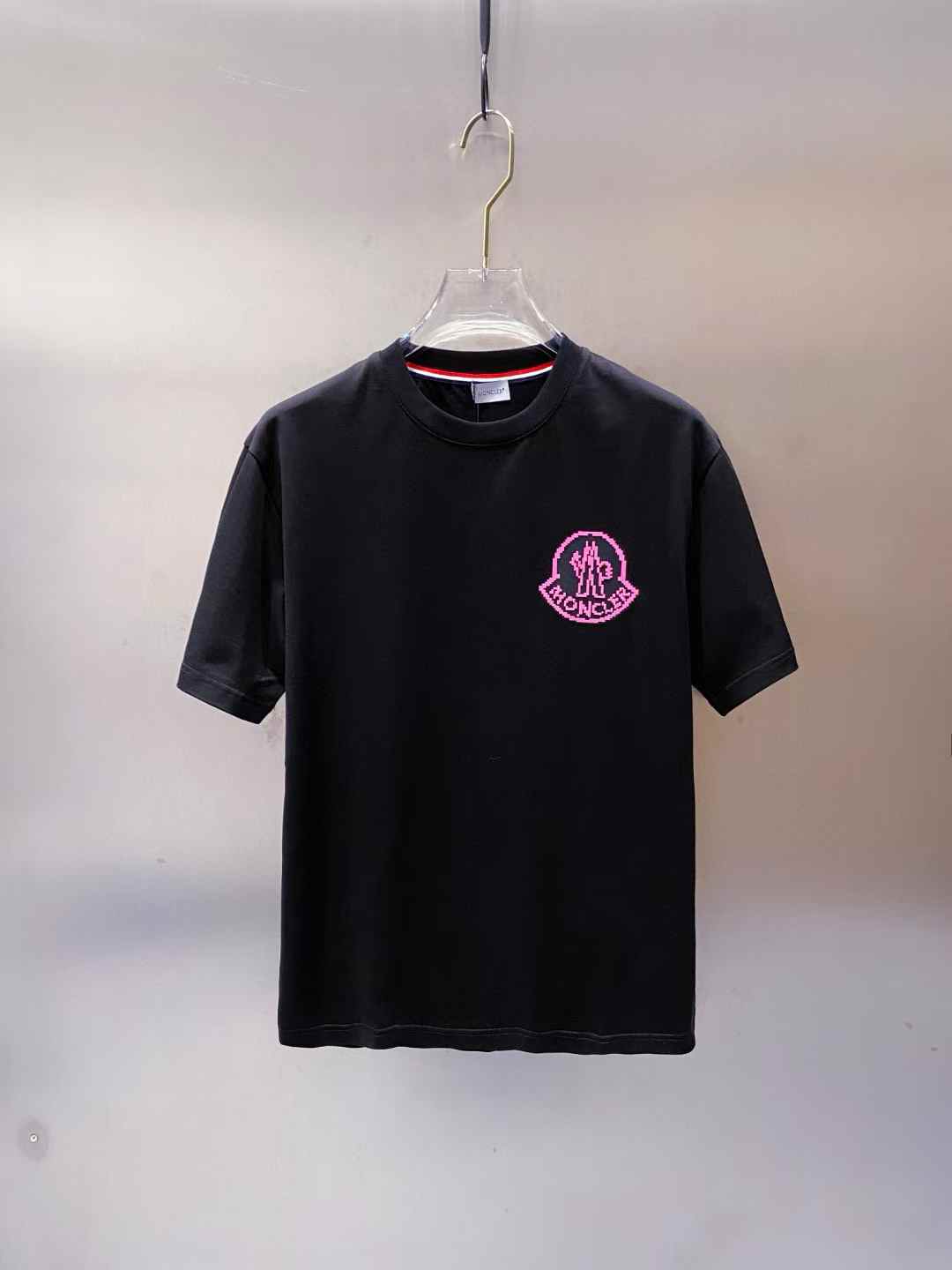 Moncler logo-embellished jersey t-shirt in black with a pink logo detail