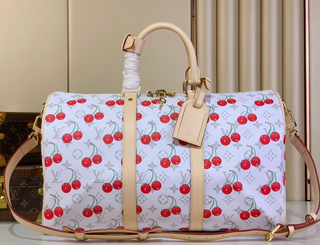 LV x Takashi Murakami Keepall Bandoulière duffle bag in the white Monogram canvas with cherry motifs