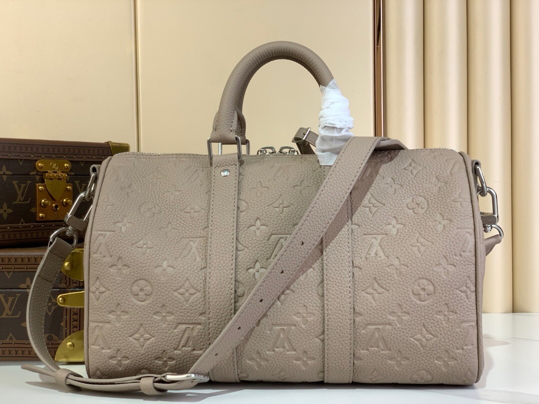 LV Keepall Bandoulière 35 duffel bag in a neutral color