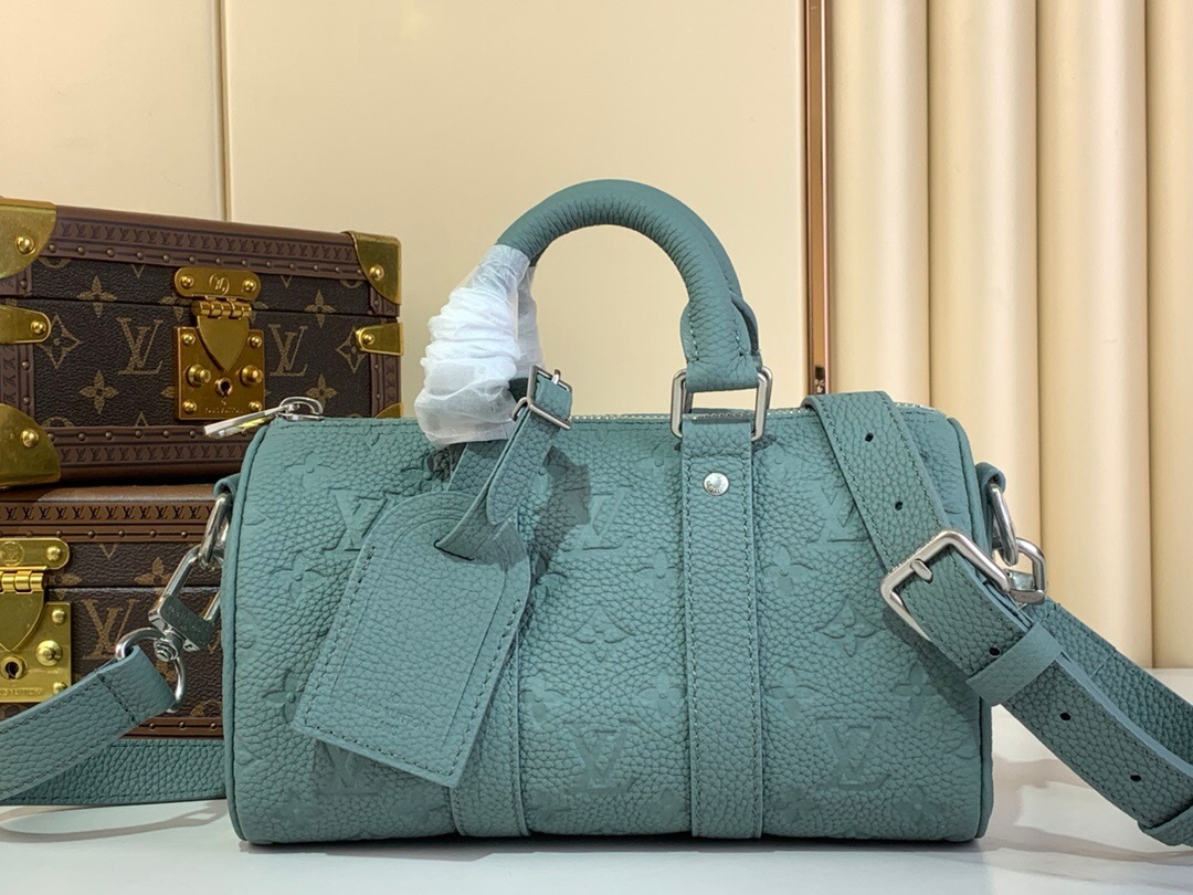 LV Keepall Bandoulière 25 bag in embossed Taurillon Monogram leather