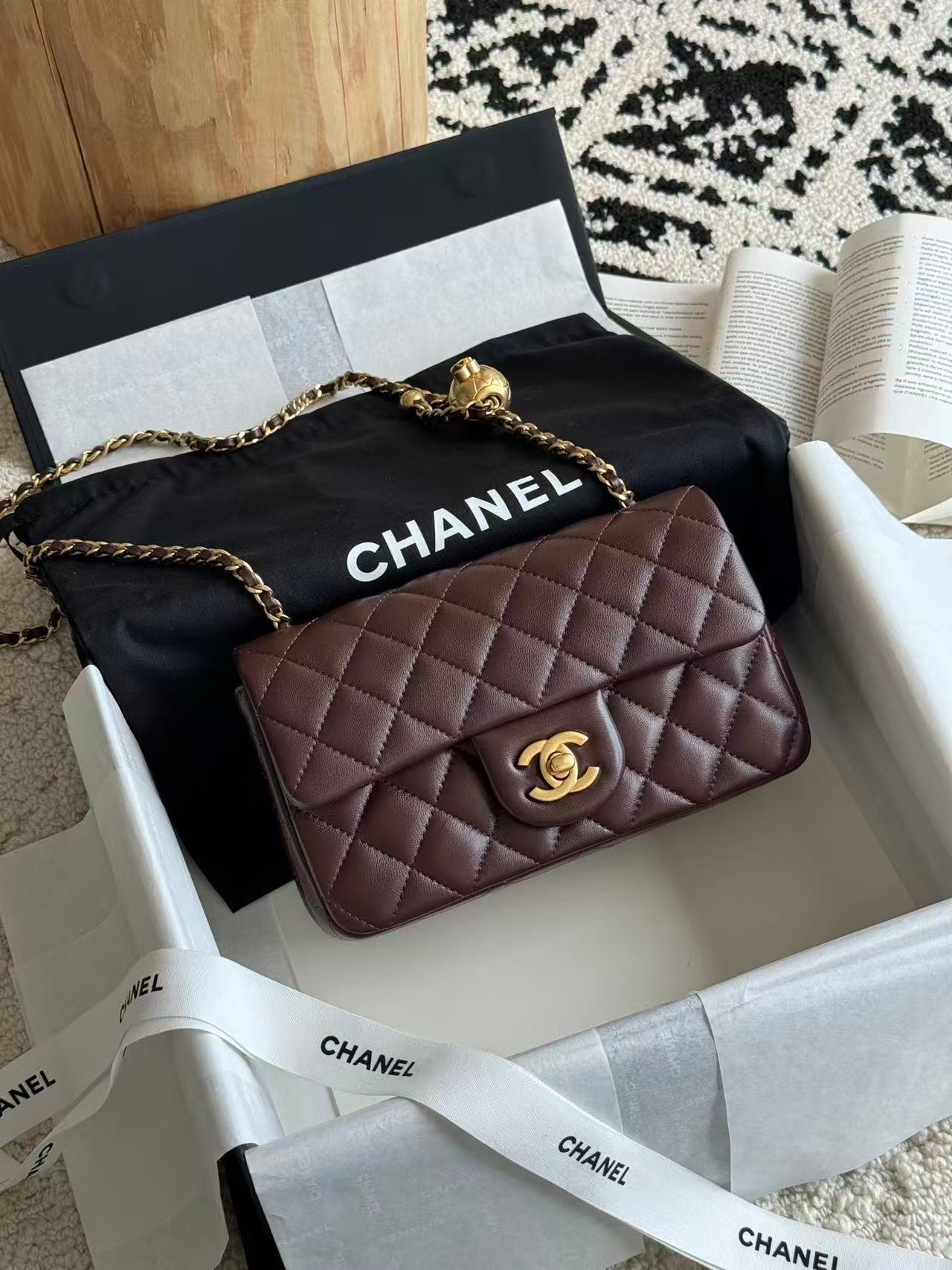Chanel medium 20cm flap bag in quilted brown leather with gold-tone hardware