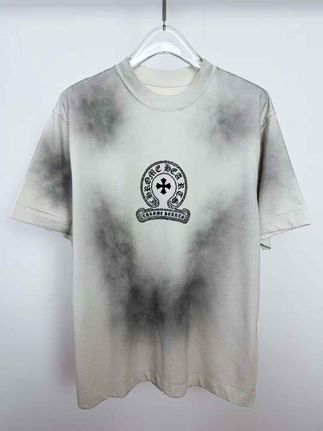 Chrome Hearts white t-shirt with a black airbrush effect and a horseshoe logo on the front