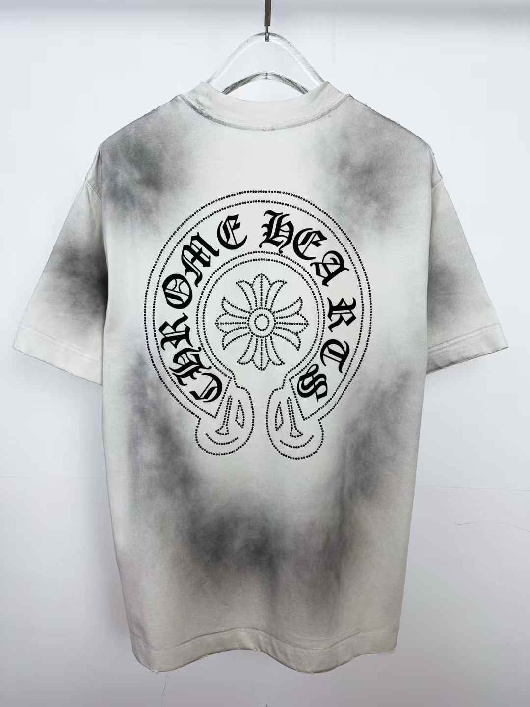 Chrome Hearts white t-shirt with a black airbrush effect and a horseshoe logo on the front