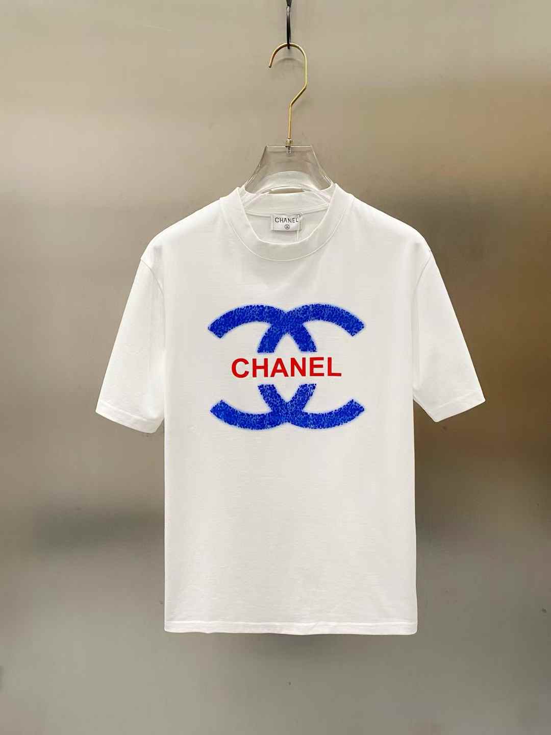 chanel white t-shirt featuring the Chanel logo
