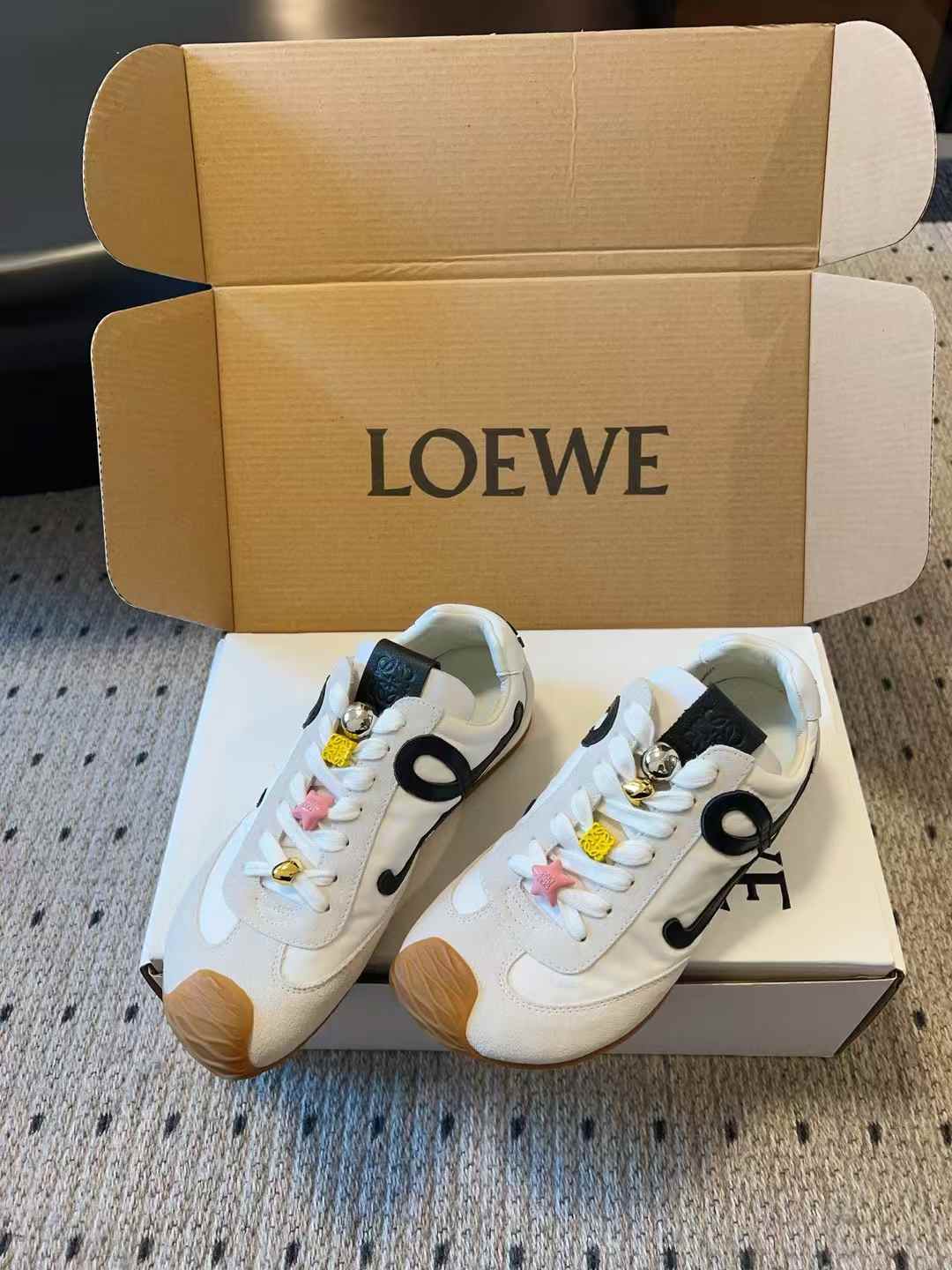 Loewe Ballet Runner 2.0 sneakers in nylon and calfskin with an asymmetrical toe and an oversized cursive 'L' monogram on the side