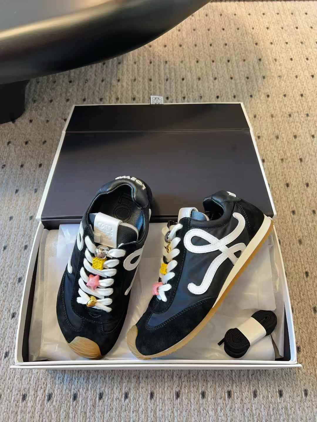 Loewe men's Ballet Runner 2.0 low top sneakers in black and white nylon and calfskin