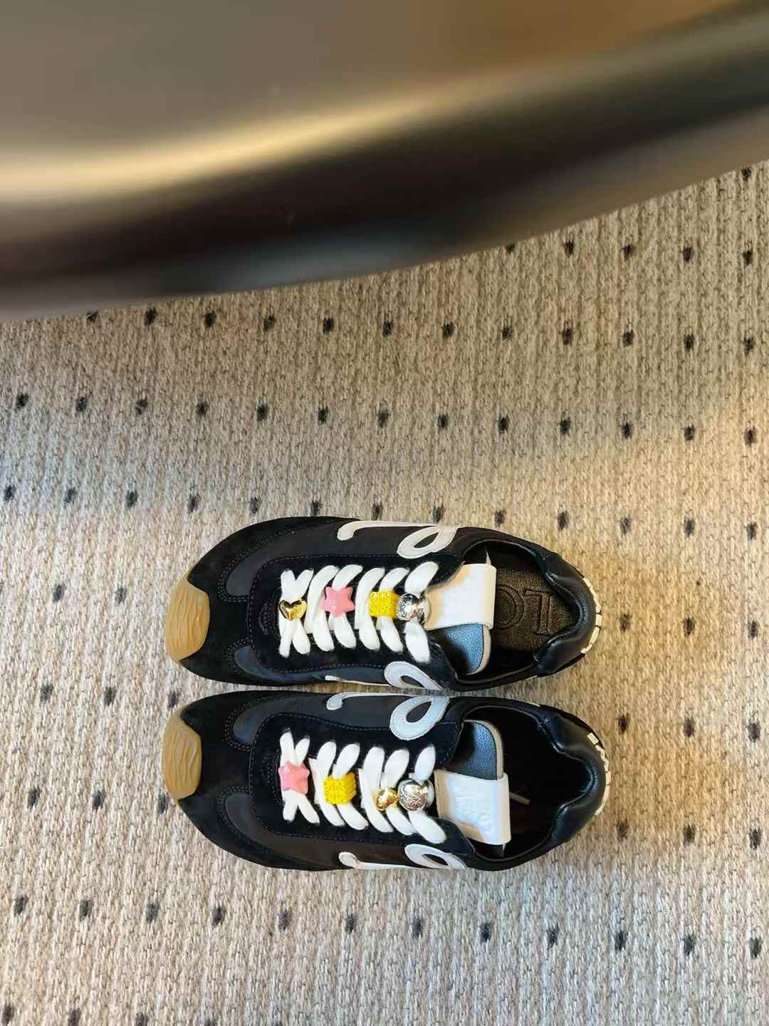 Loewe men's Ballet Runner 2.0 low top sneakers in black and white nylon and calfskin