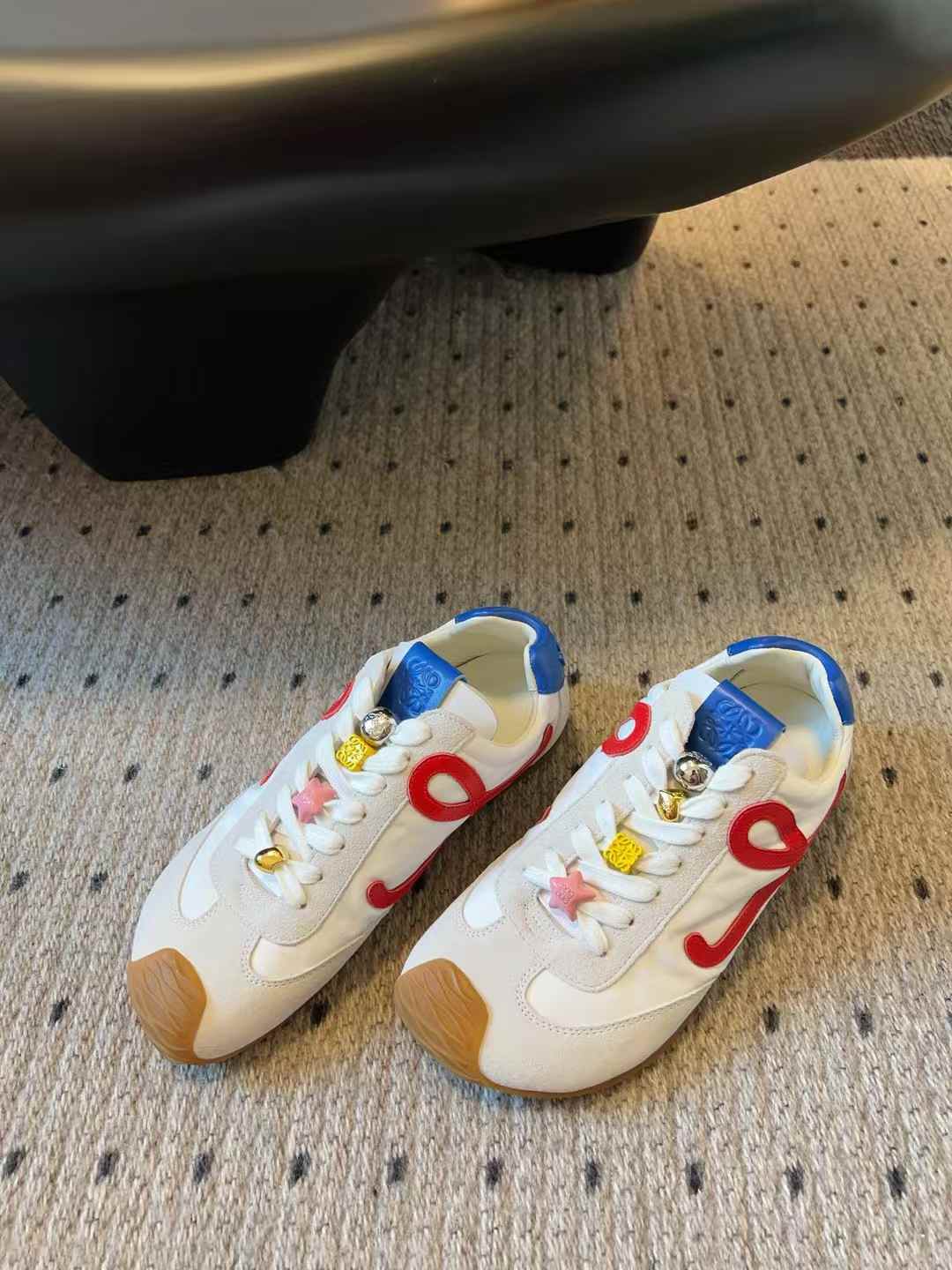 Loewe Women's Ballet Runner 2.0 sneakers in nylon and calfskin, featuring a soft white, cherry, and royal blue colorway