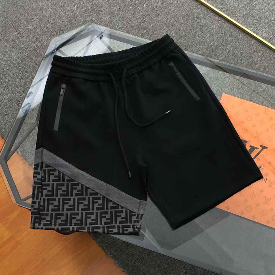 fendi black shorts with a grey diagonal panel featuring the signature Fendi "FF" monogram pattern