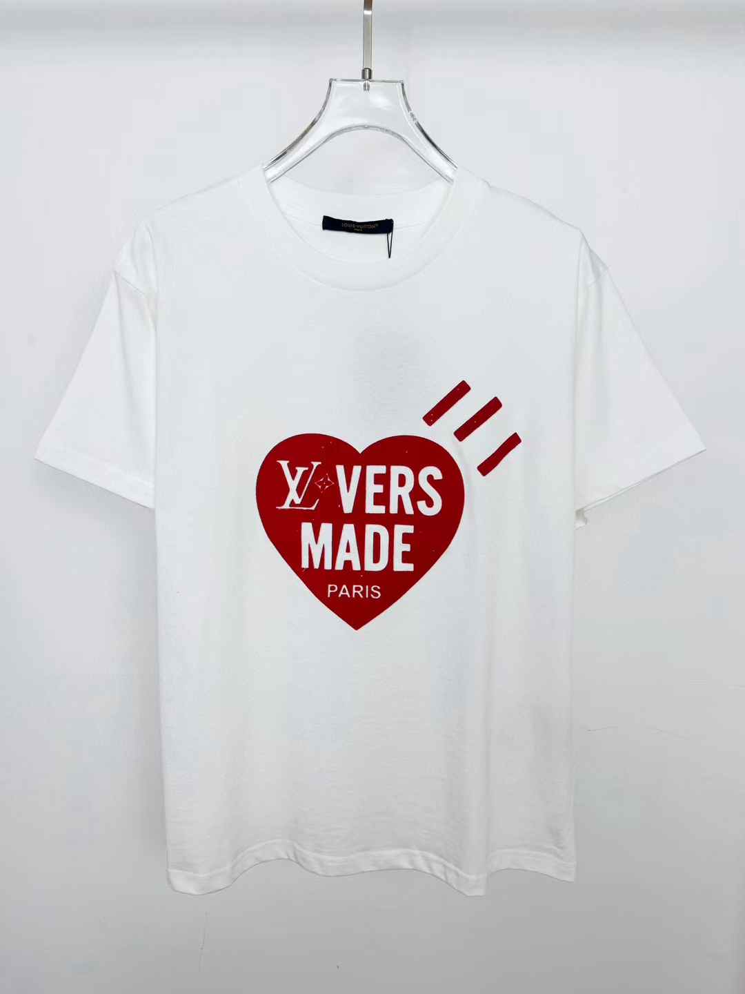 LV x Human Made white cotton t-shirt with a red heart graphic and "LV VERS MADE PARIS" text
