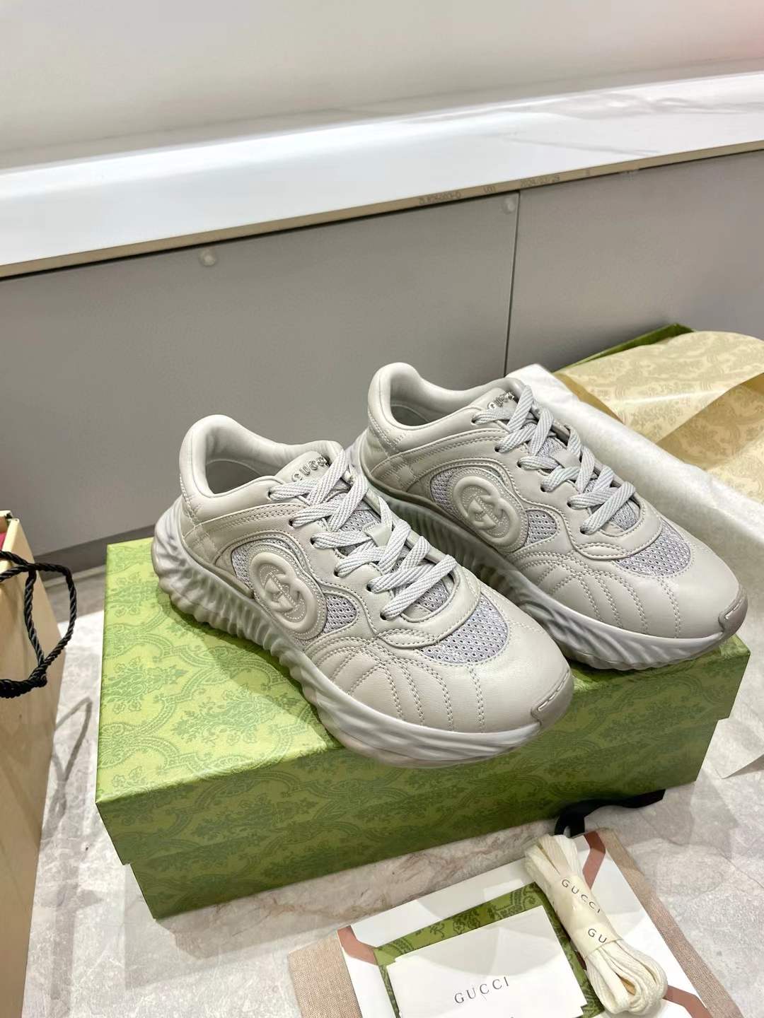 Gucci Interlocking G leather and mesh "Ripple" sneakers in grey