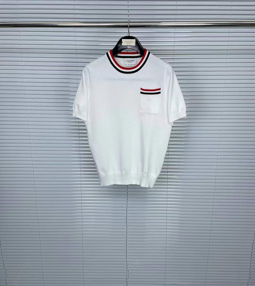 Thom Browne pointelle-knit cotton T-shirt in white with a chest pocket and signature RWB stripe details