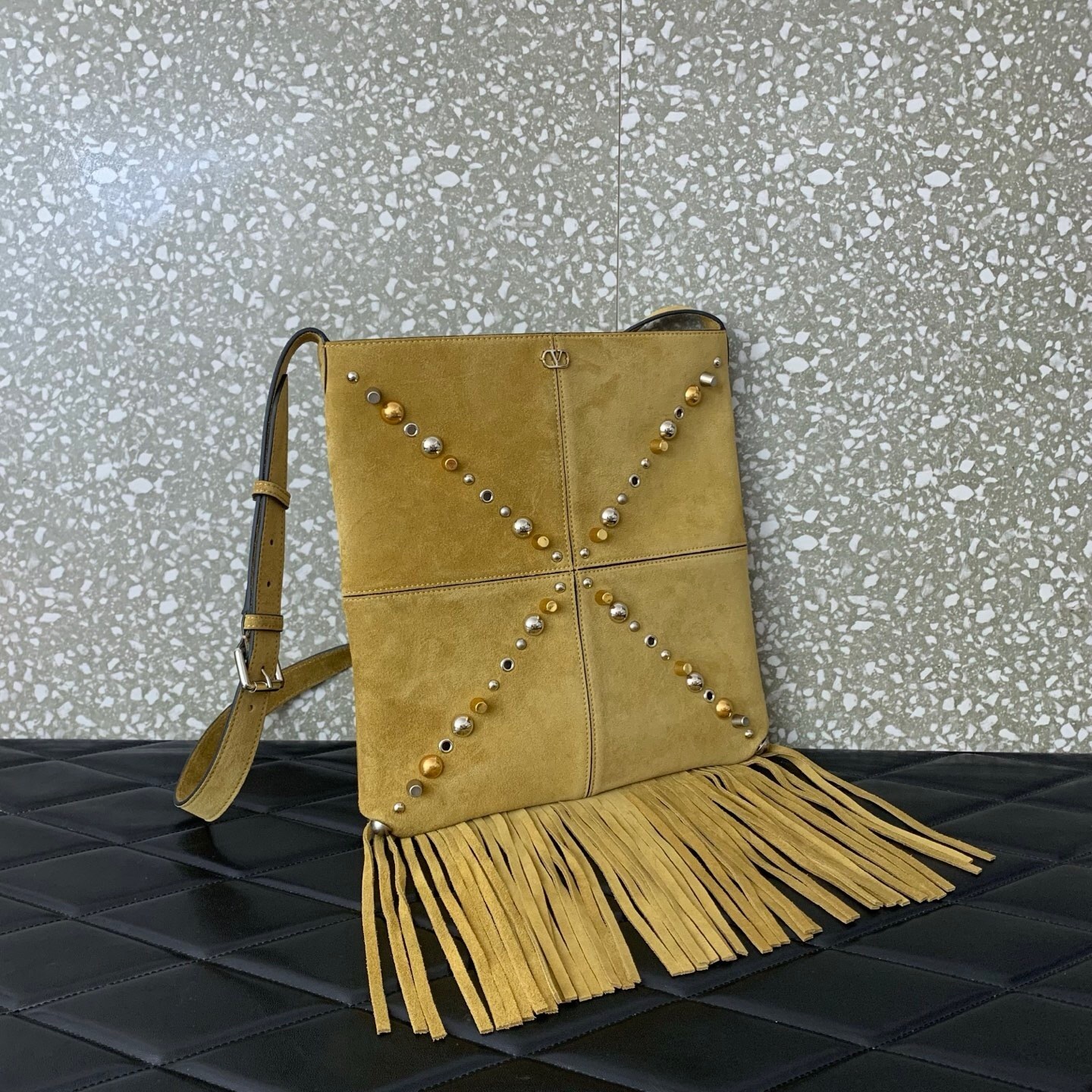 Valentino Garavani Nellcôte fringed suede shoulder bag in brown with gold and silver-tone stud embellishments
