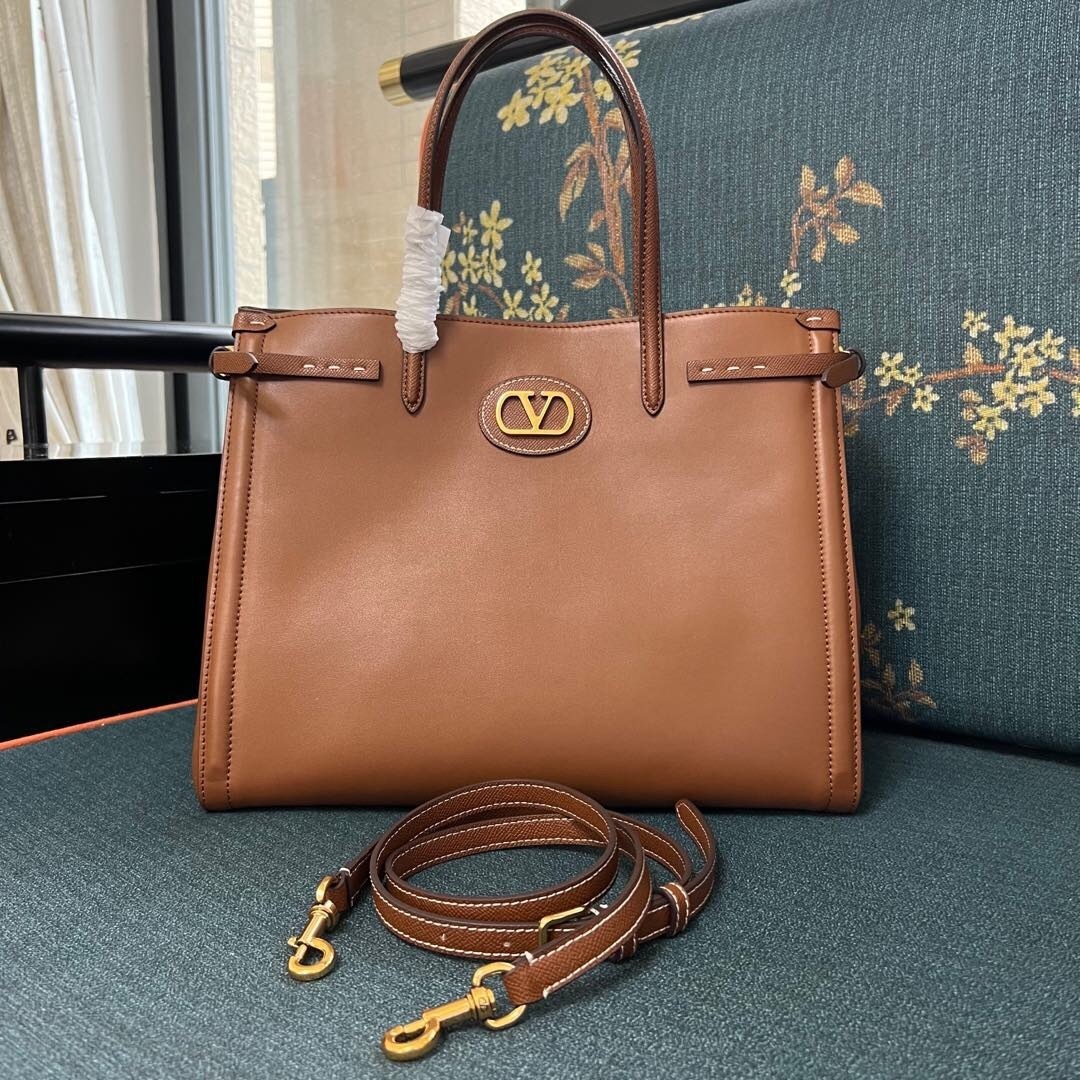 Valentino Garavani Antibes medium calfskin shopping bag in brown