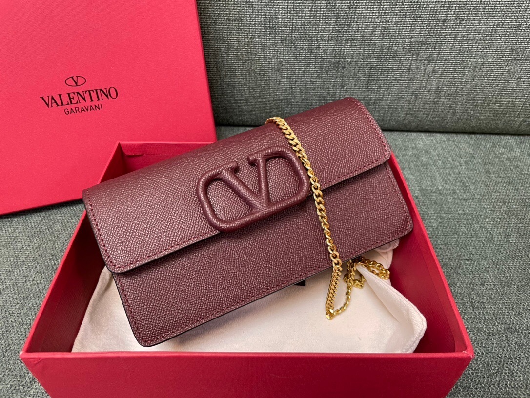 Valentino Garavani VLOGO Signature chain wallet in burgundy grained calfskin leather