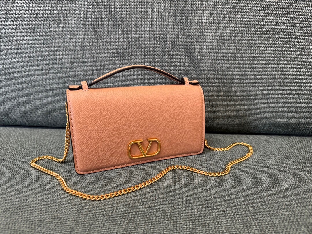 Valentino Garavani VLogo Signature grained calfskin wallet on a chain