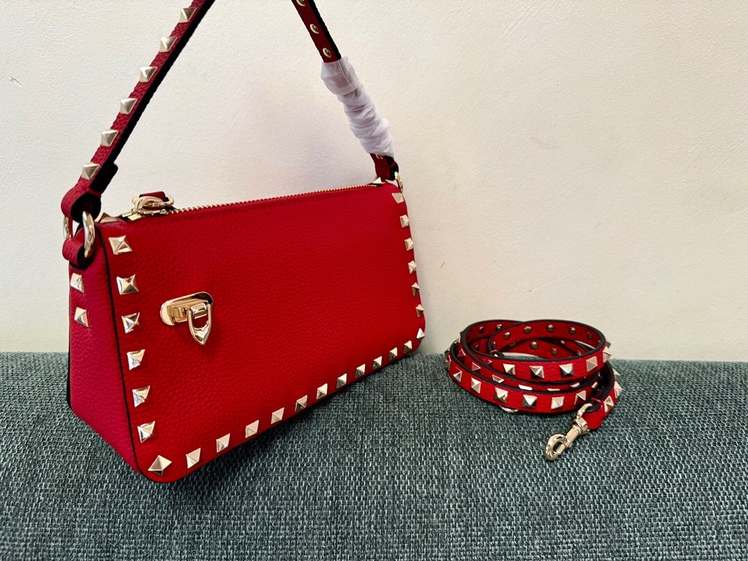 Valentino Garavani Rockstud small crossbody bag in red grained calfskin with gold-tone hardware
