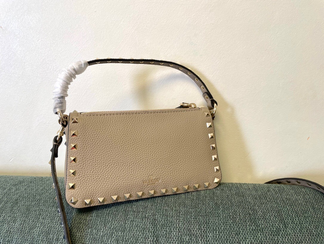 Valentino Garavani Rockstud small crossbody bag in grainy calfskin leather with platinum-finish metal studs
