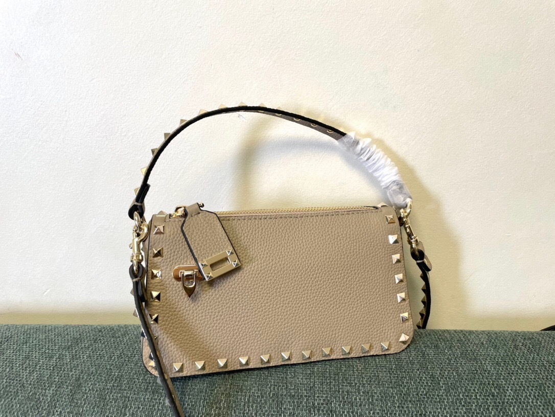 Valentino Garavani Rockstud small crossbody bag in grainy calfskin leather with platinum-finish metal studs