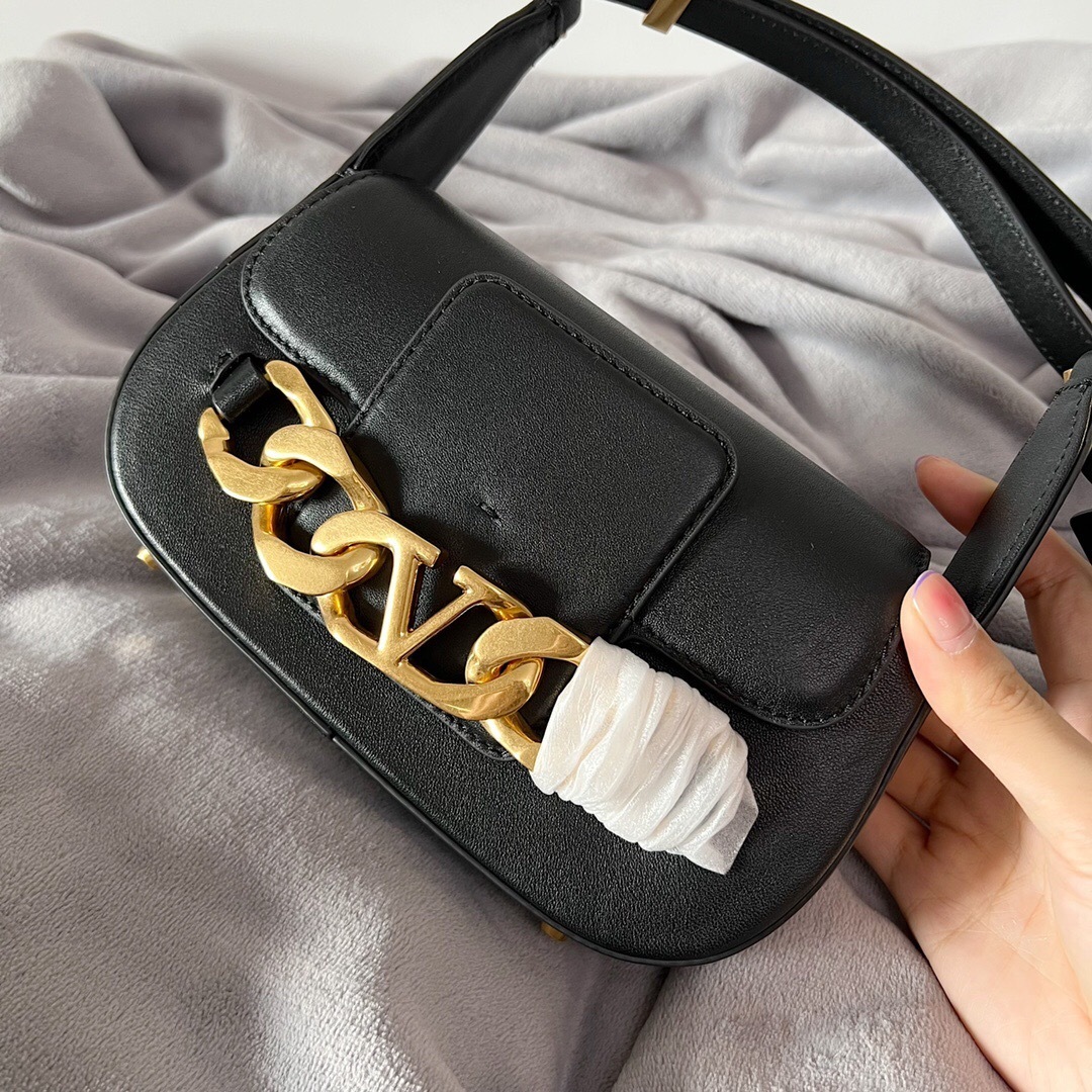 Valentino Garavani VLogo Chain small shoulder bag in black calfskin leather