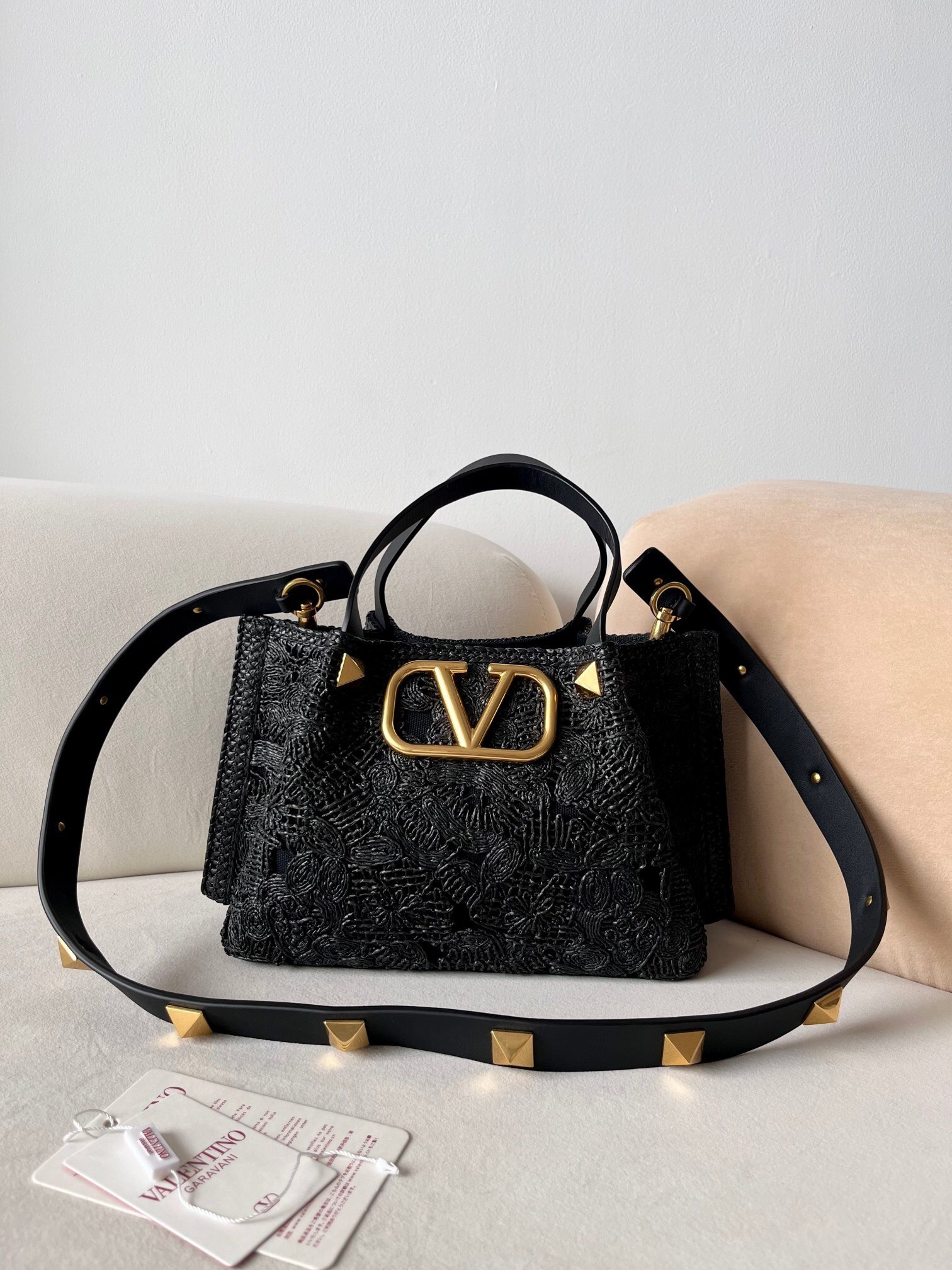 Valentino Garavani Alltime medium handbag in grainy calfskin with a metallic VLogo Signature element