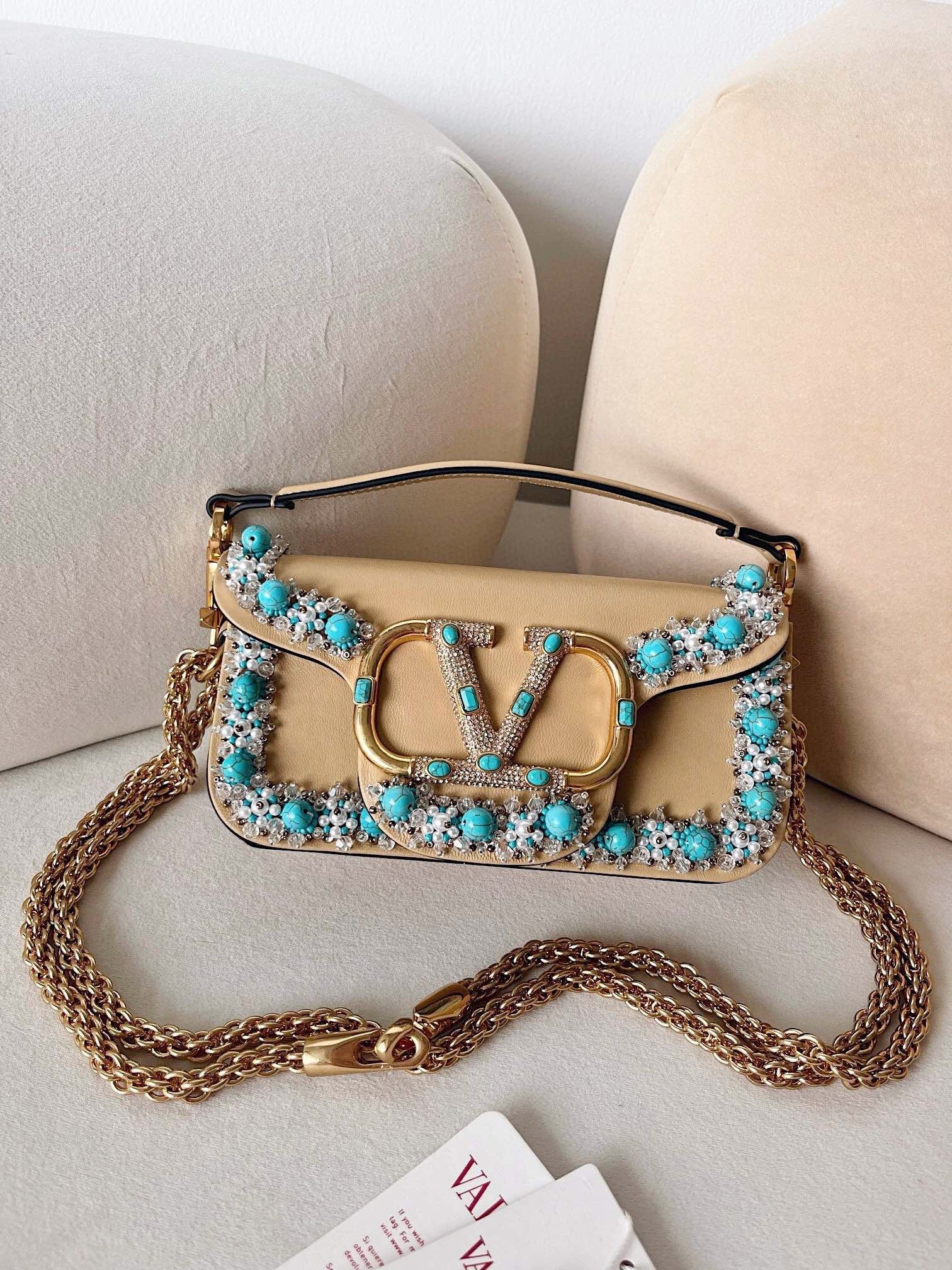 Valentino Garavani Locò small shoulder bag in leather with turquoise and crystal embellishments