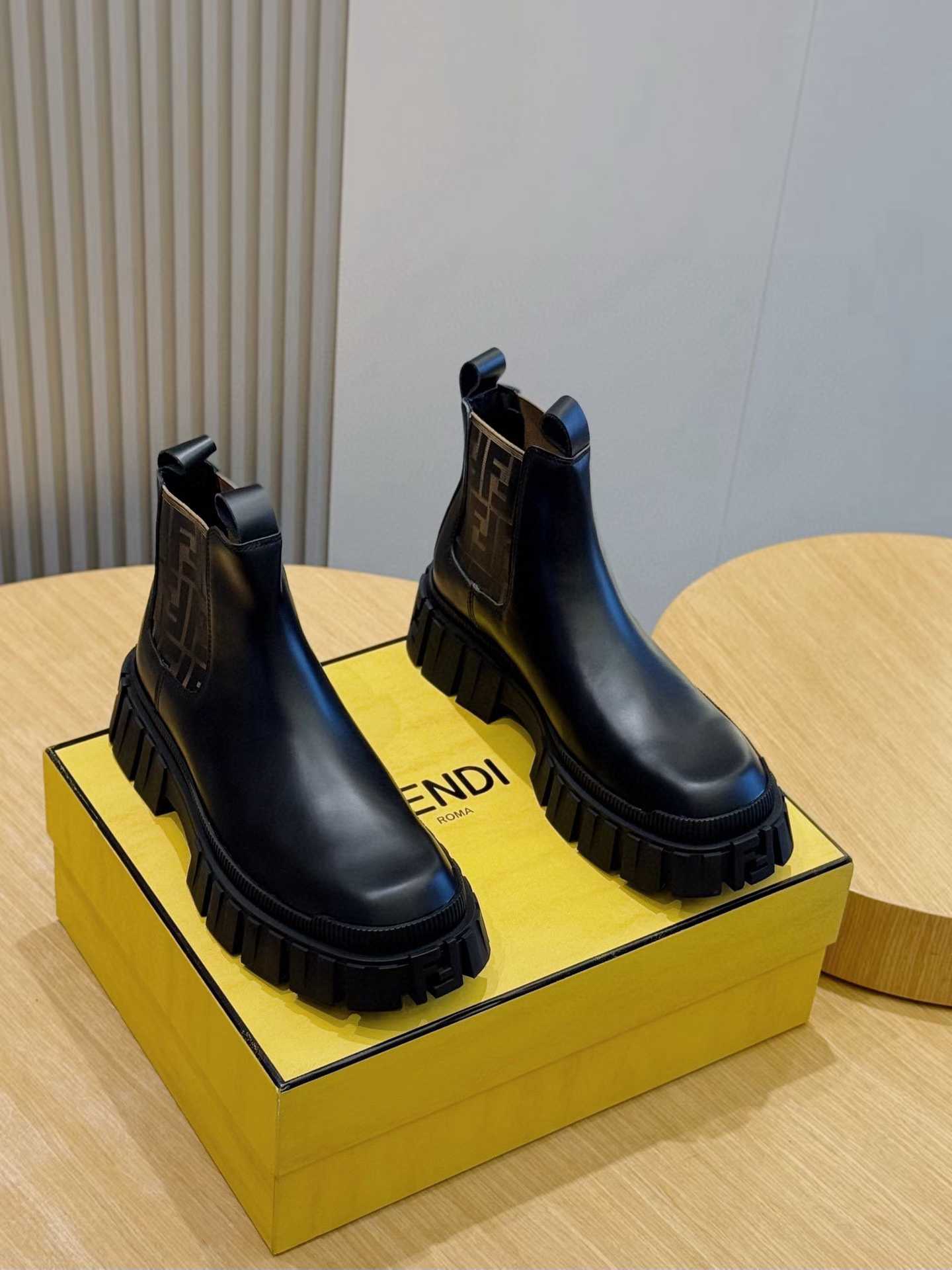 Fendi Force Chelsea boots in black leather with an FF motif lug sole