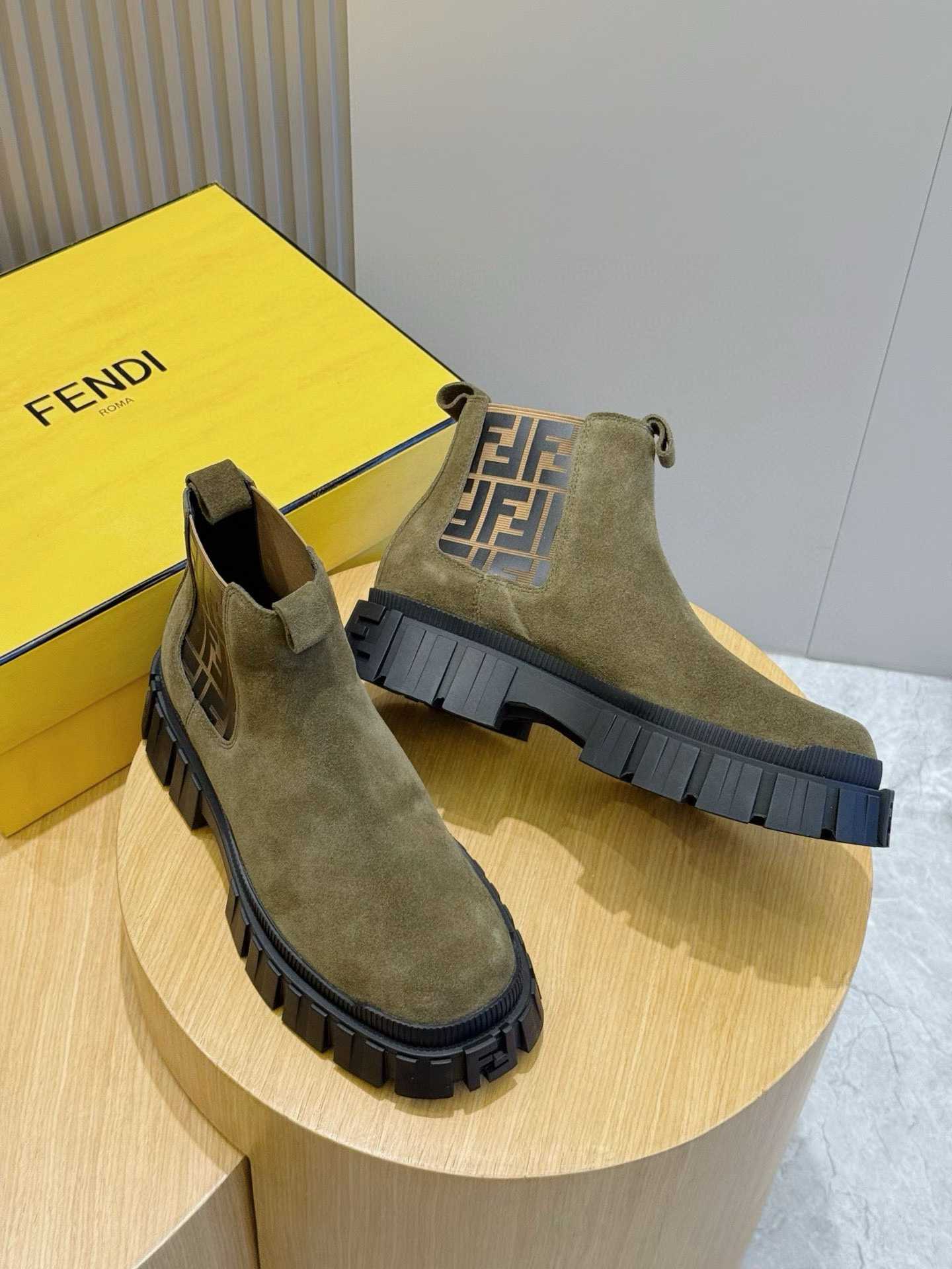 Fendi Force Chelsea boots in brown suede with the signature FF jacquard pattern on the side gores and a chunky rubber sole