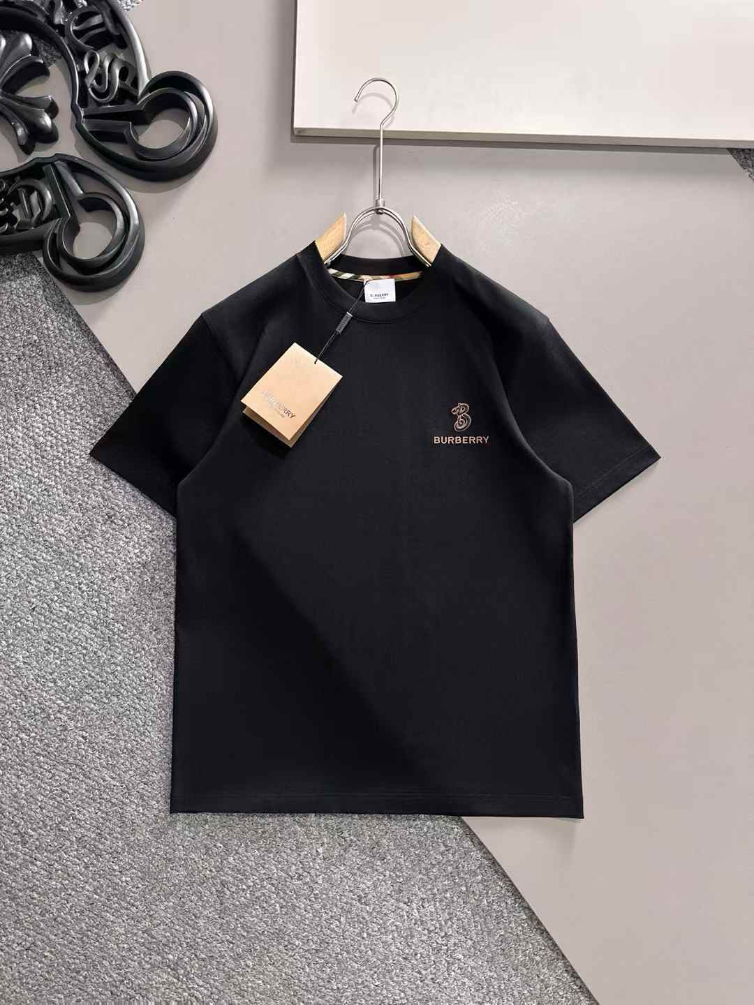 Burberry black cotton t-shirt with a gold-colored Thomas Burberry monogram logo