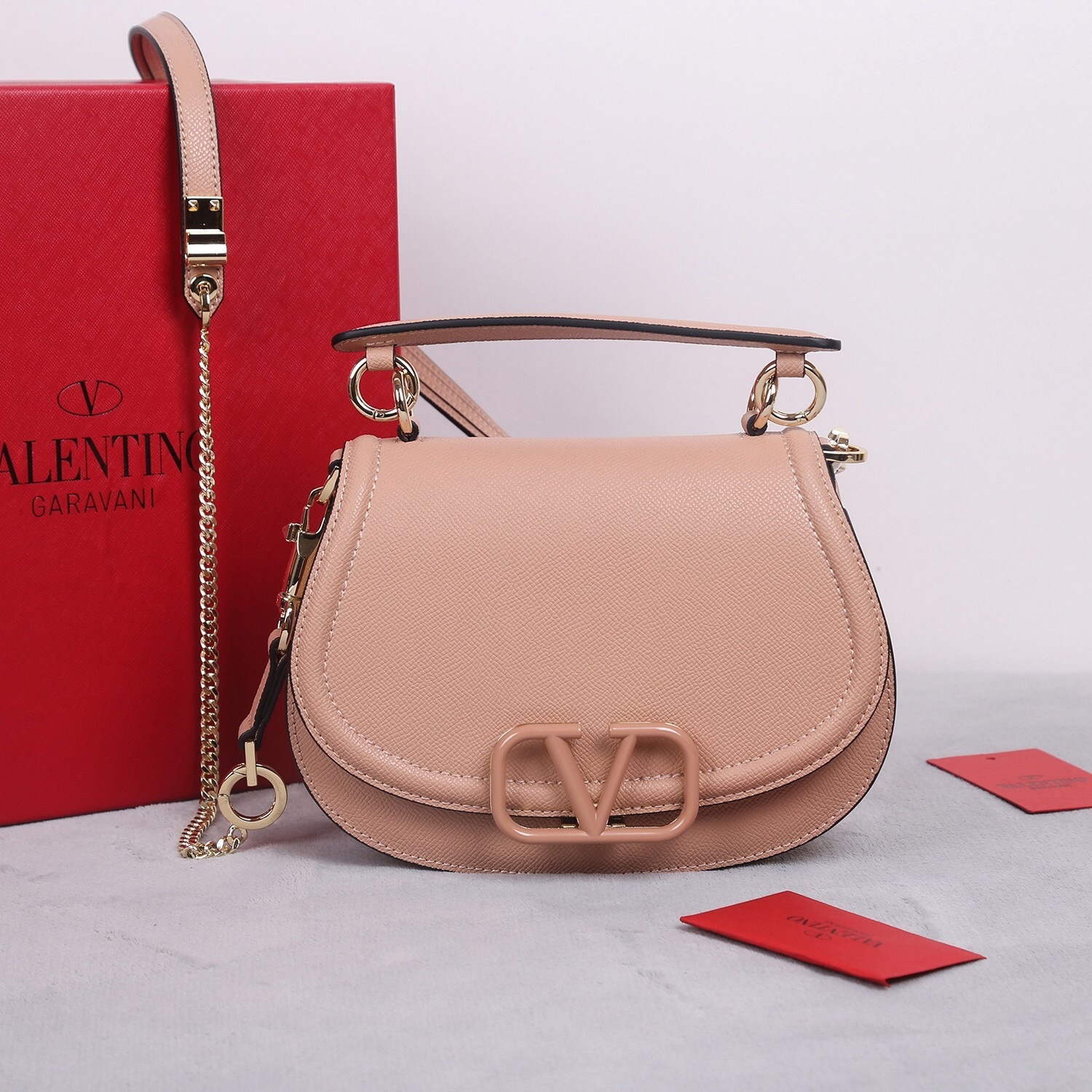 Valentino Garavani VSLING small handbag in grainy calfskin leather with a jewelled VLogo Signature closure