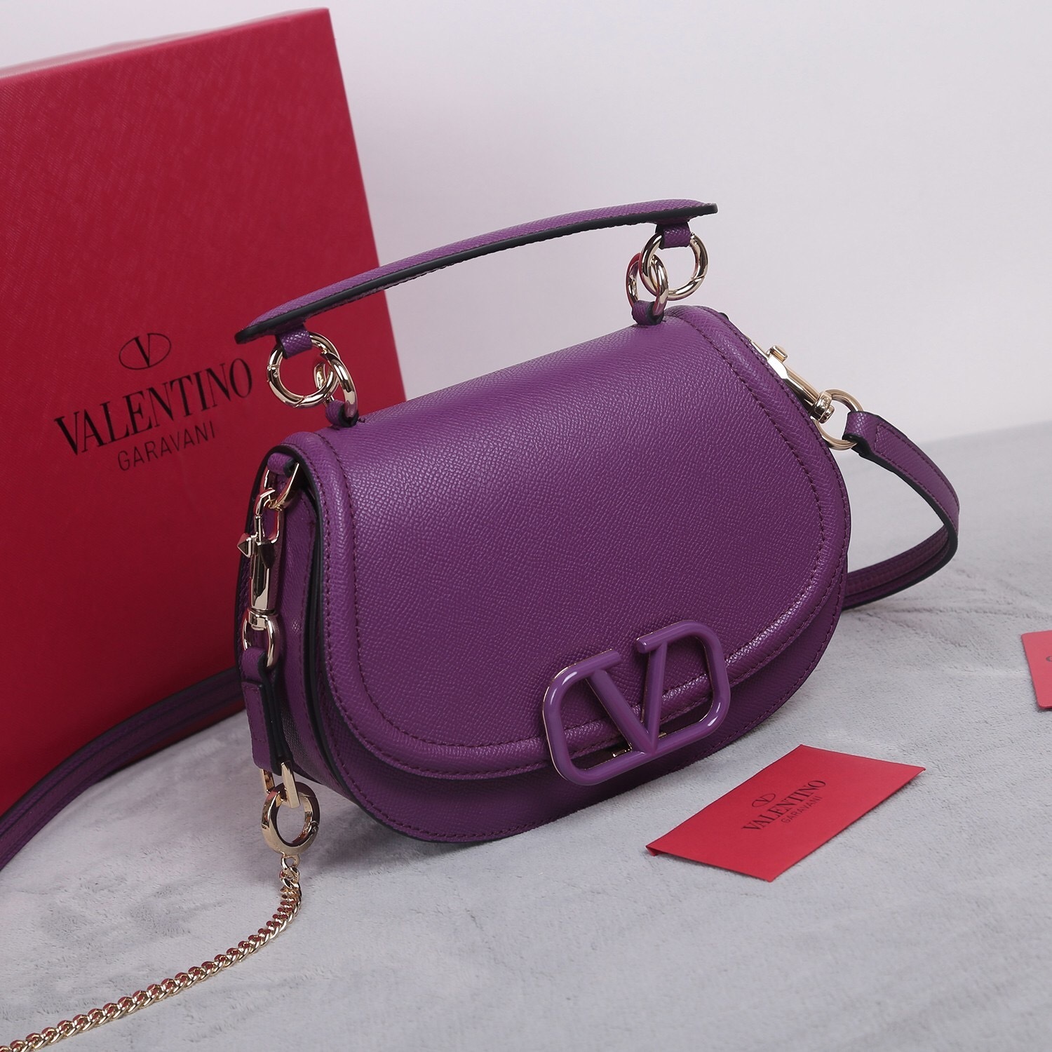 Valentino Garavani small leather shoulder bag in purple