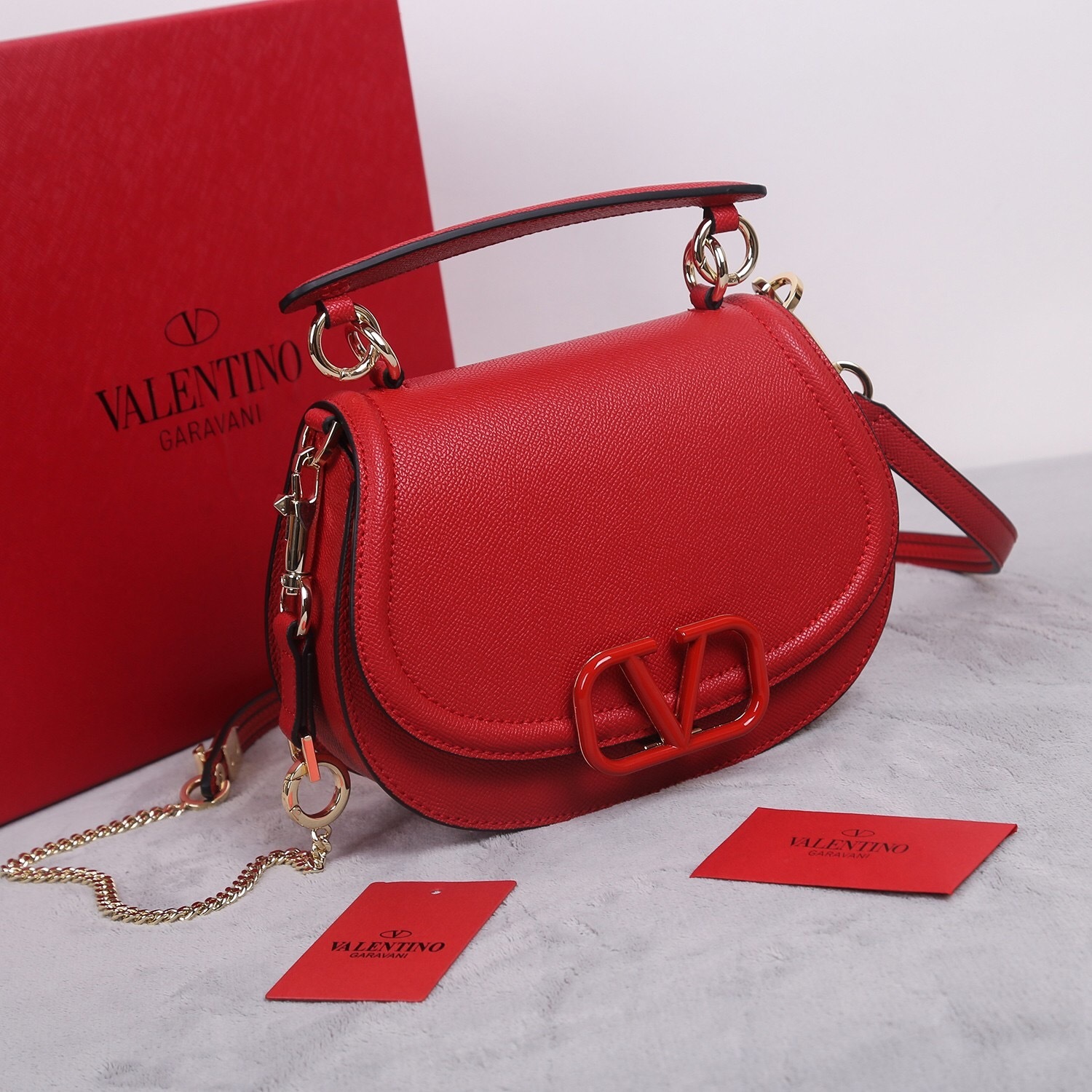 Valentino Garavani VLogo Signature mini shoulder bag in grainy calfskin leather red