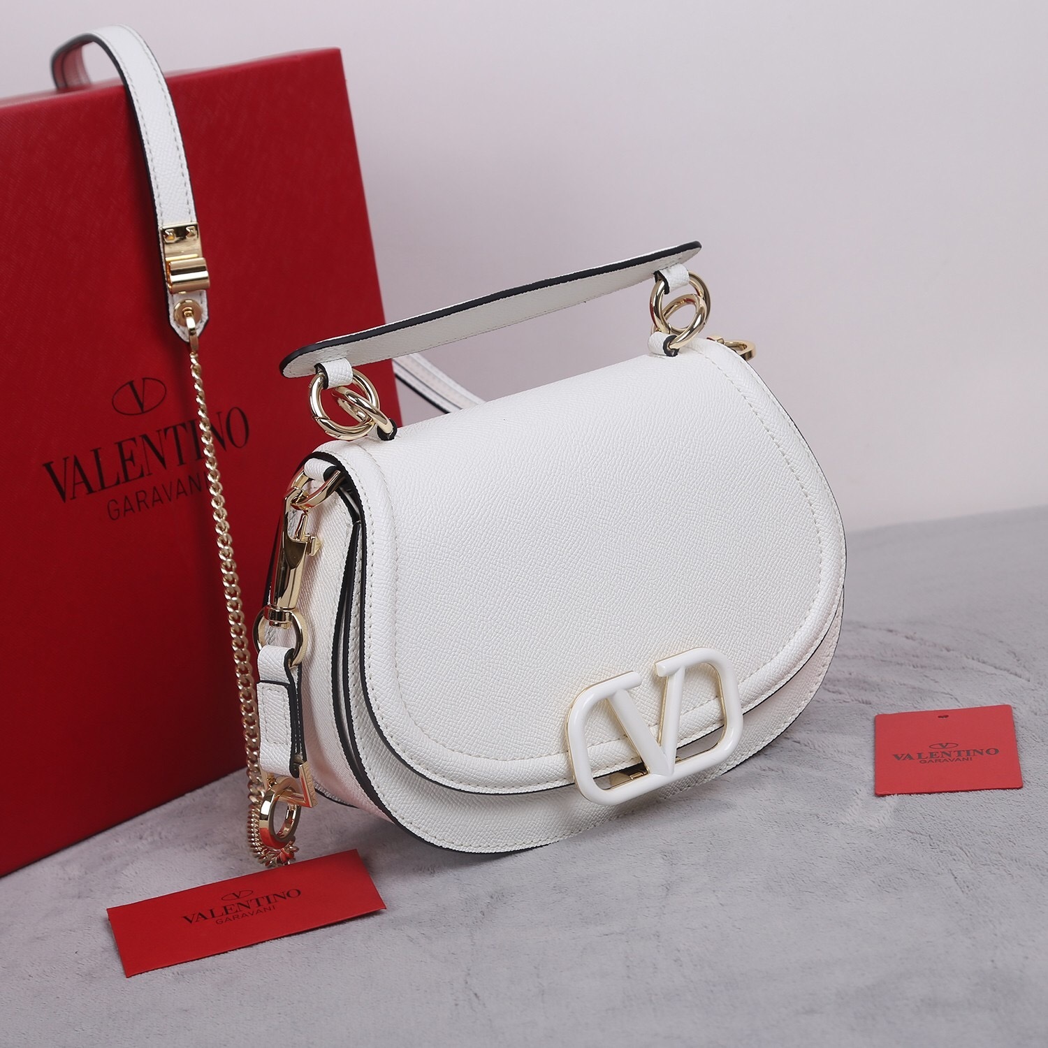 Valentino Garavani VSLING shoulder bag in grainy calfskin leather with a tone-on-tone VLogo Signature closure