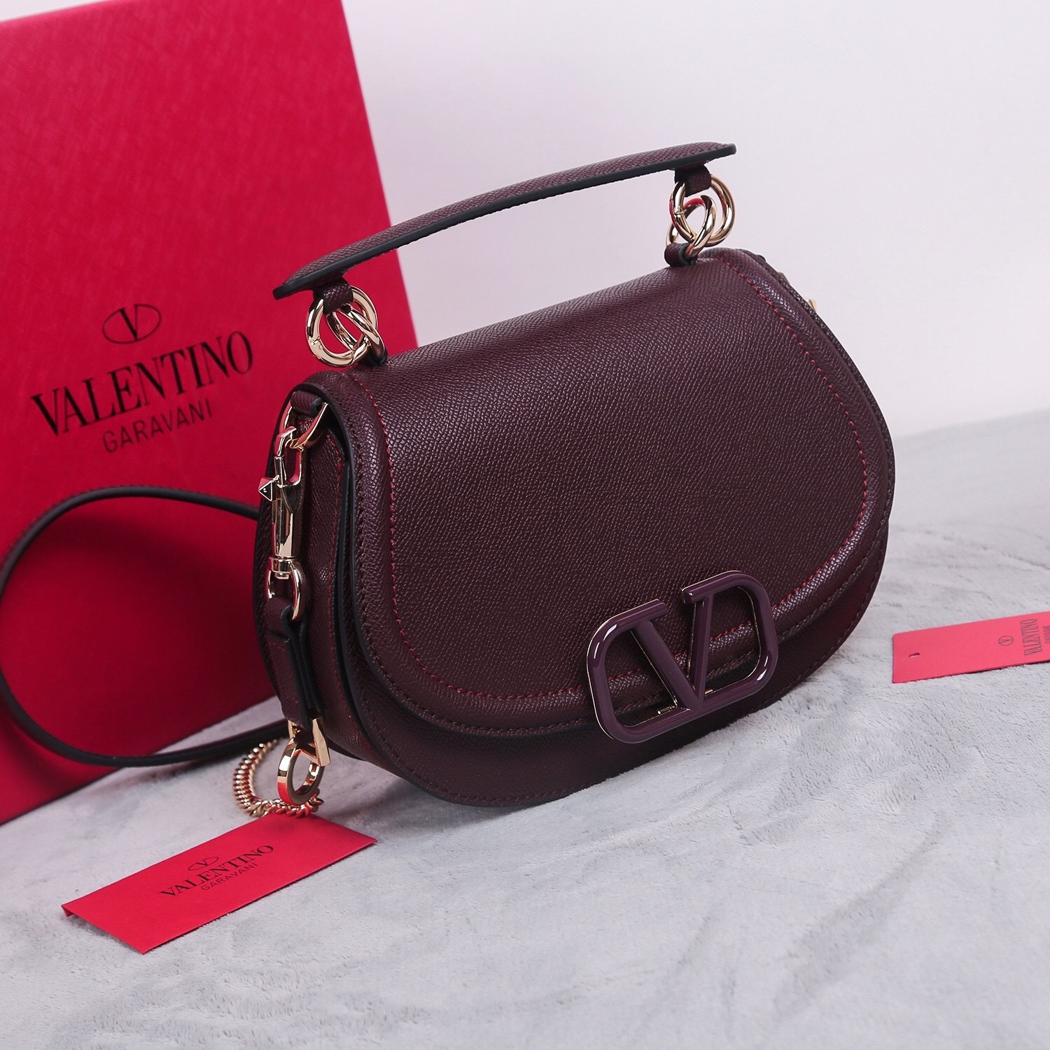 Valentino Garavani VSLING small handbag in grainy calfskin leather with a VLogo Signature closure