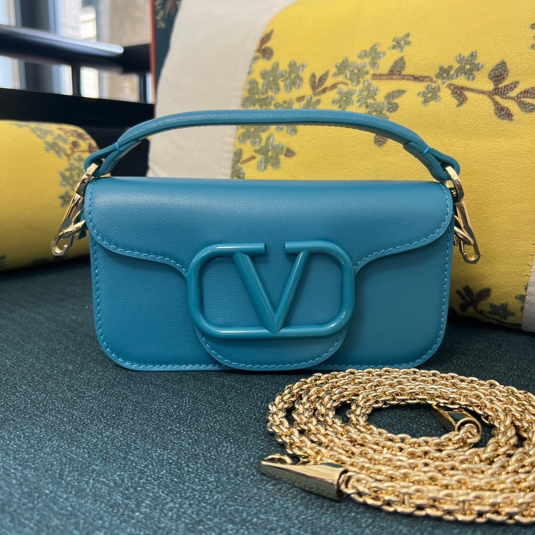 Valentino Garavani Locò small shoulder bag in sky blue calfskin leather