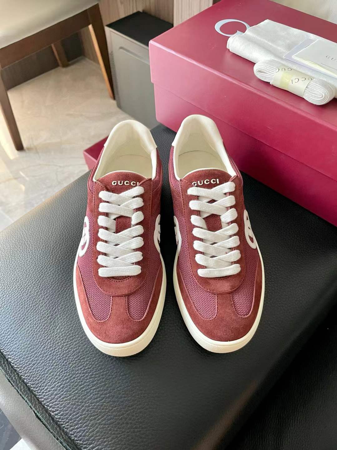 Gucci Interlocking G suede and canvas low-top sneakers in a bordeaux (red/maroon) color