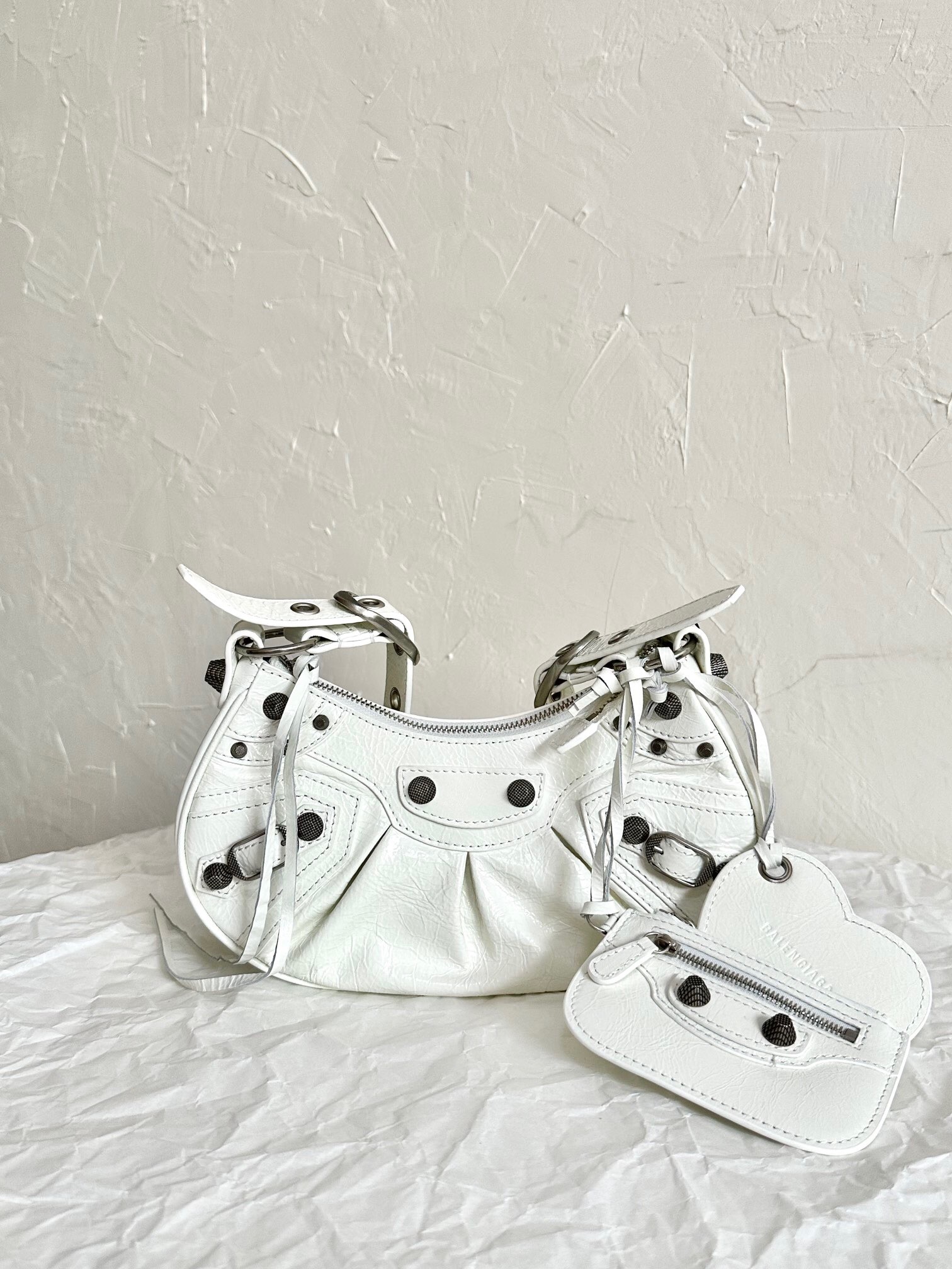Balenciaga Le Cagole XS shoulder bag in white Arena lambskin leather