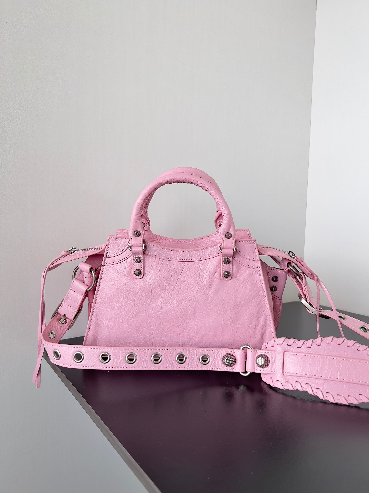 Balenciaga Neo Cagole City XS top handle bag in pink Arena lambskin leather