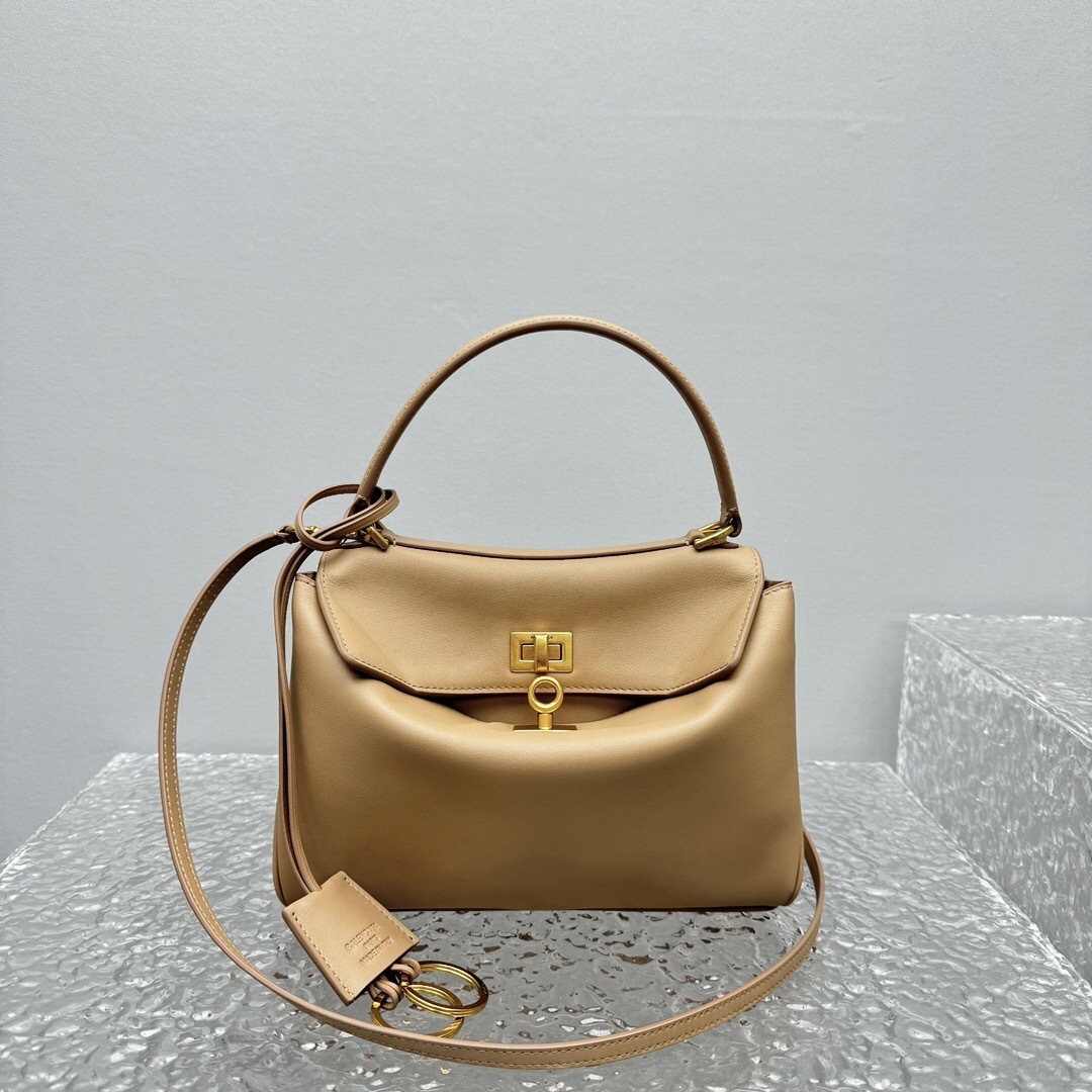 Balenciaga Rodeo mini leather tote bag in a beige or camel color with gold-tone hardware