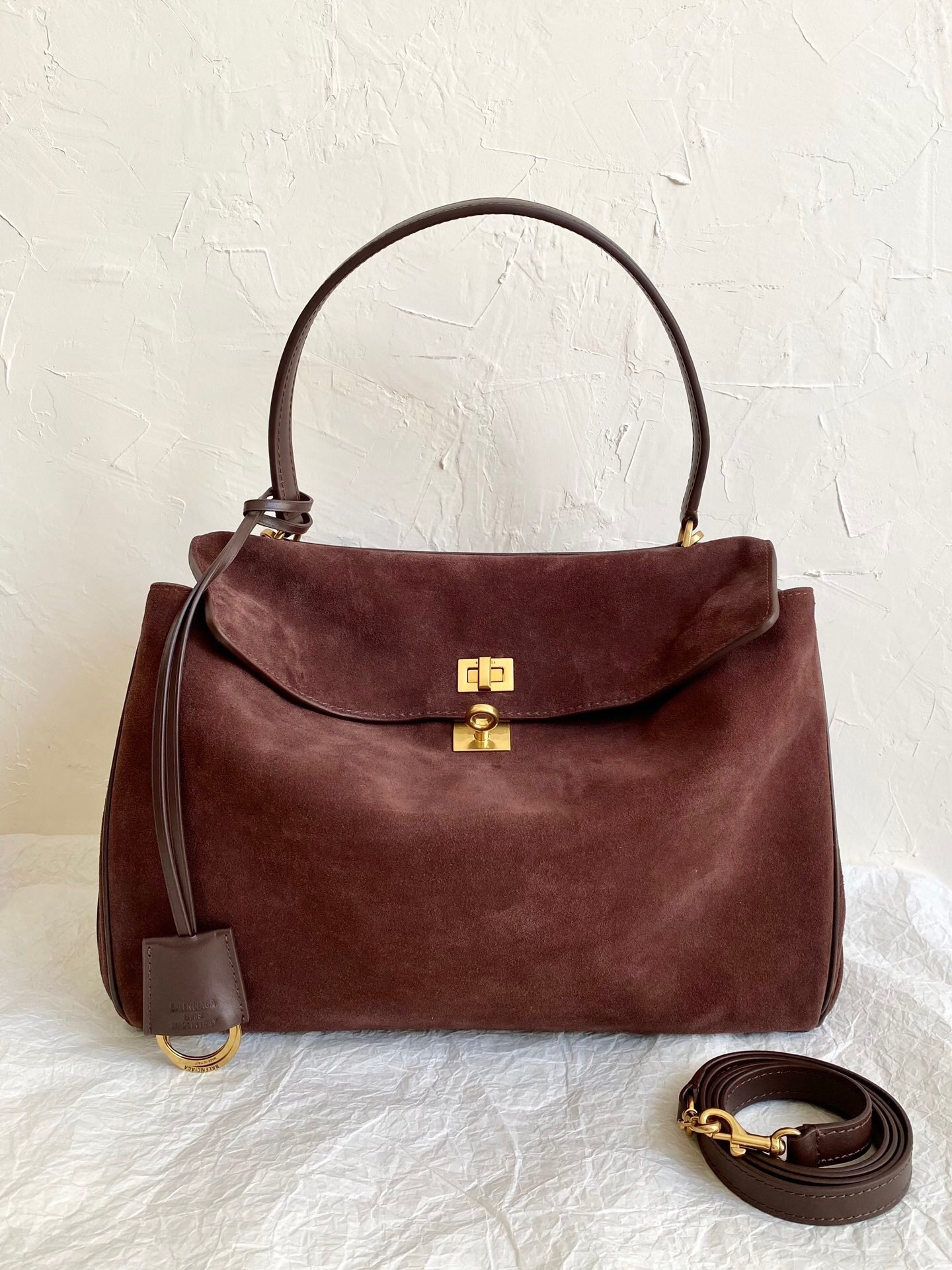 Balenciaga genuine suede top handle bag in a coffee or brown color