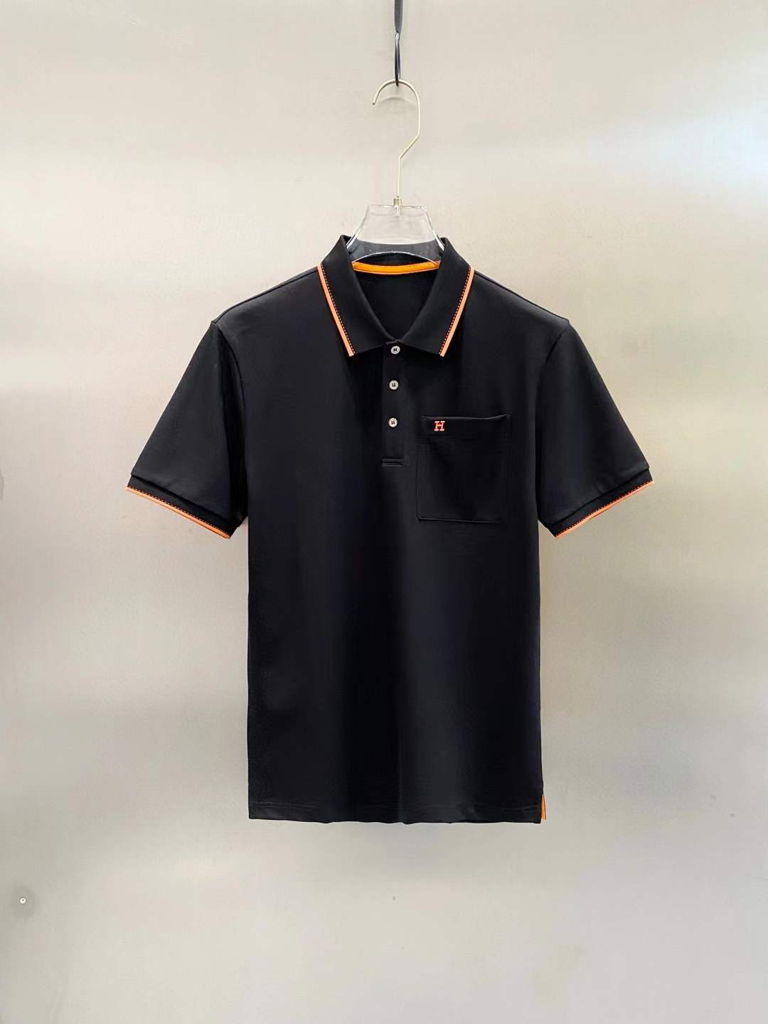 Hermes men's black polo shirt with orange piping