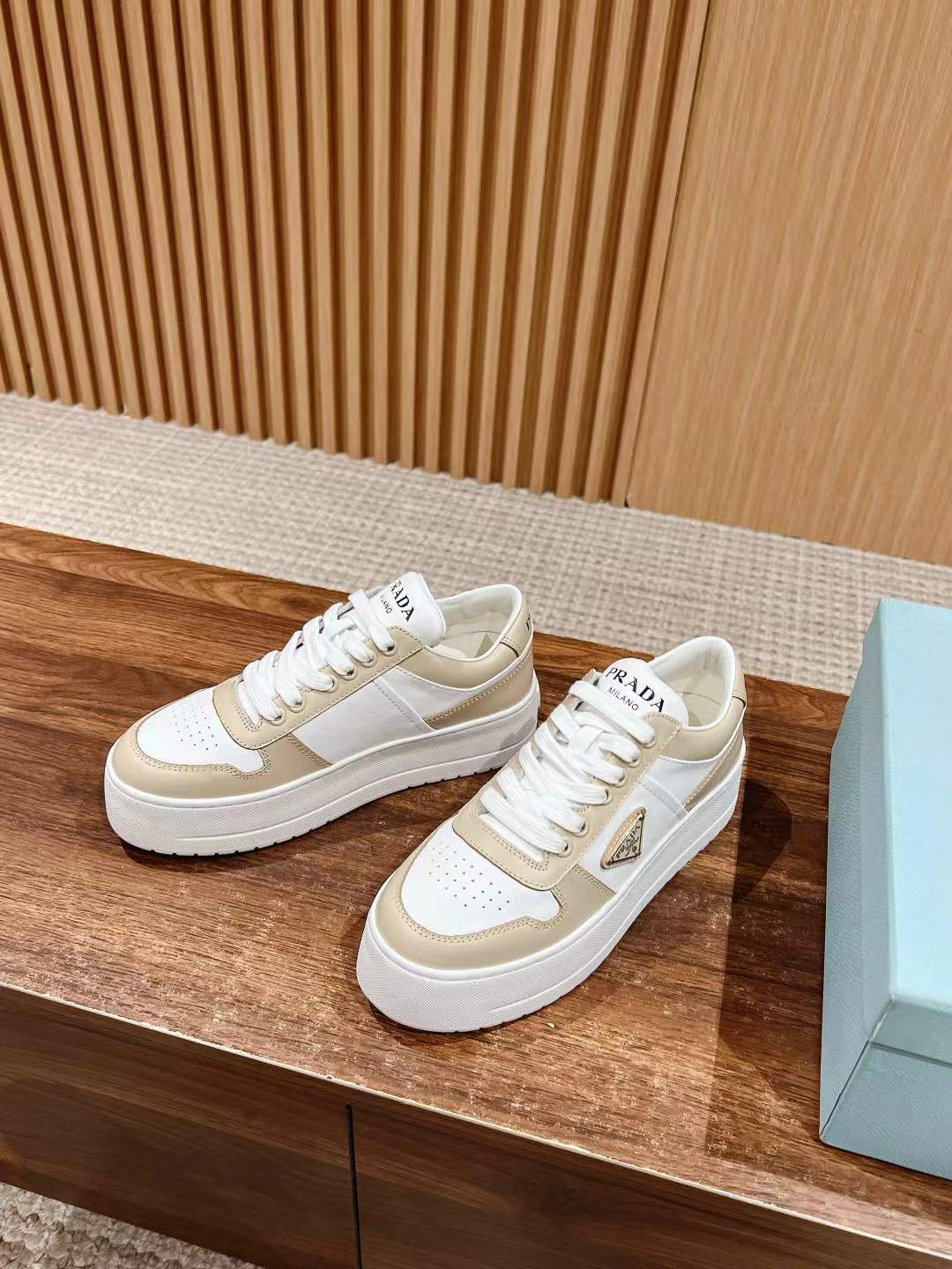 Prada Downtown Bold leather sneakers in a desert and white colorway