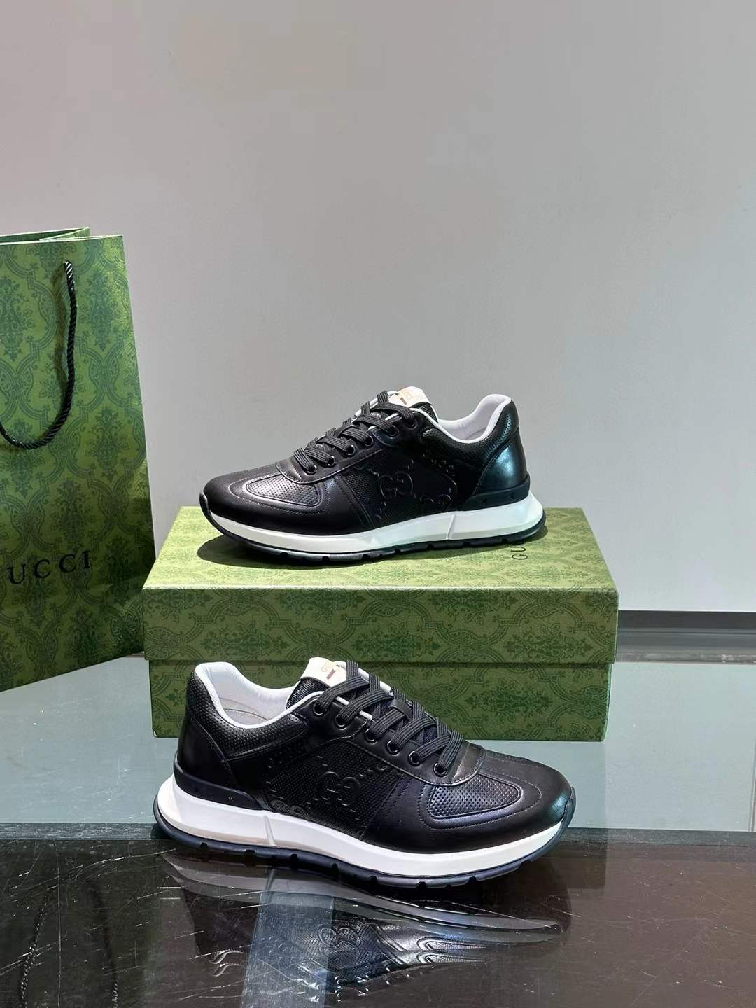 gucci classic black and white retro-style leather and mesh sneakers