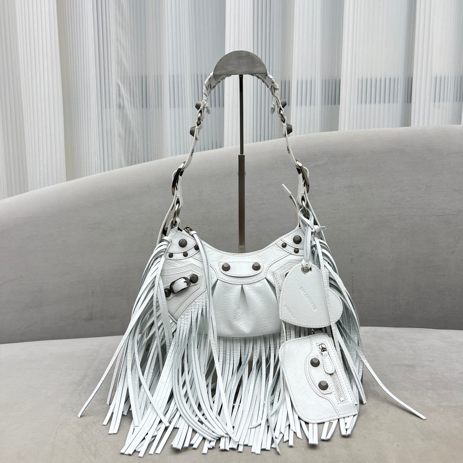 Balenciaga Le Cagole XS shoulder bag in white lamb leather