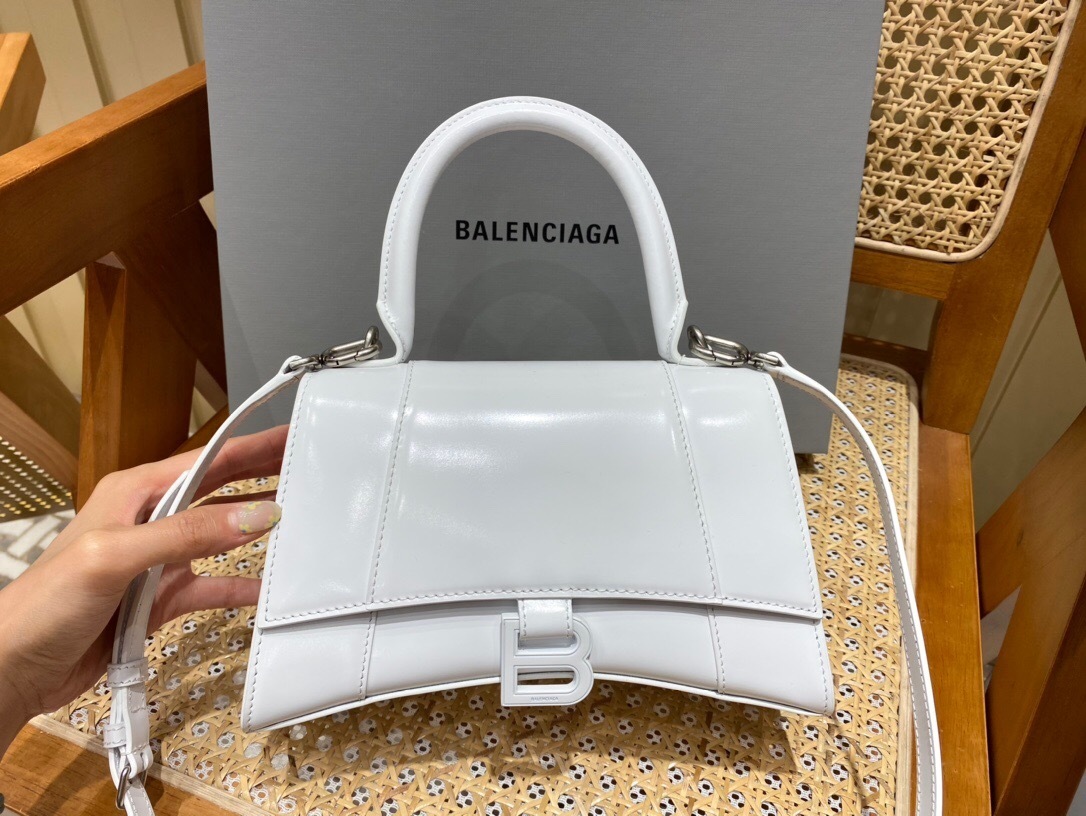 Balenciaga Hourglass top-handle bag in white leather with a silver-tone "B" logo