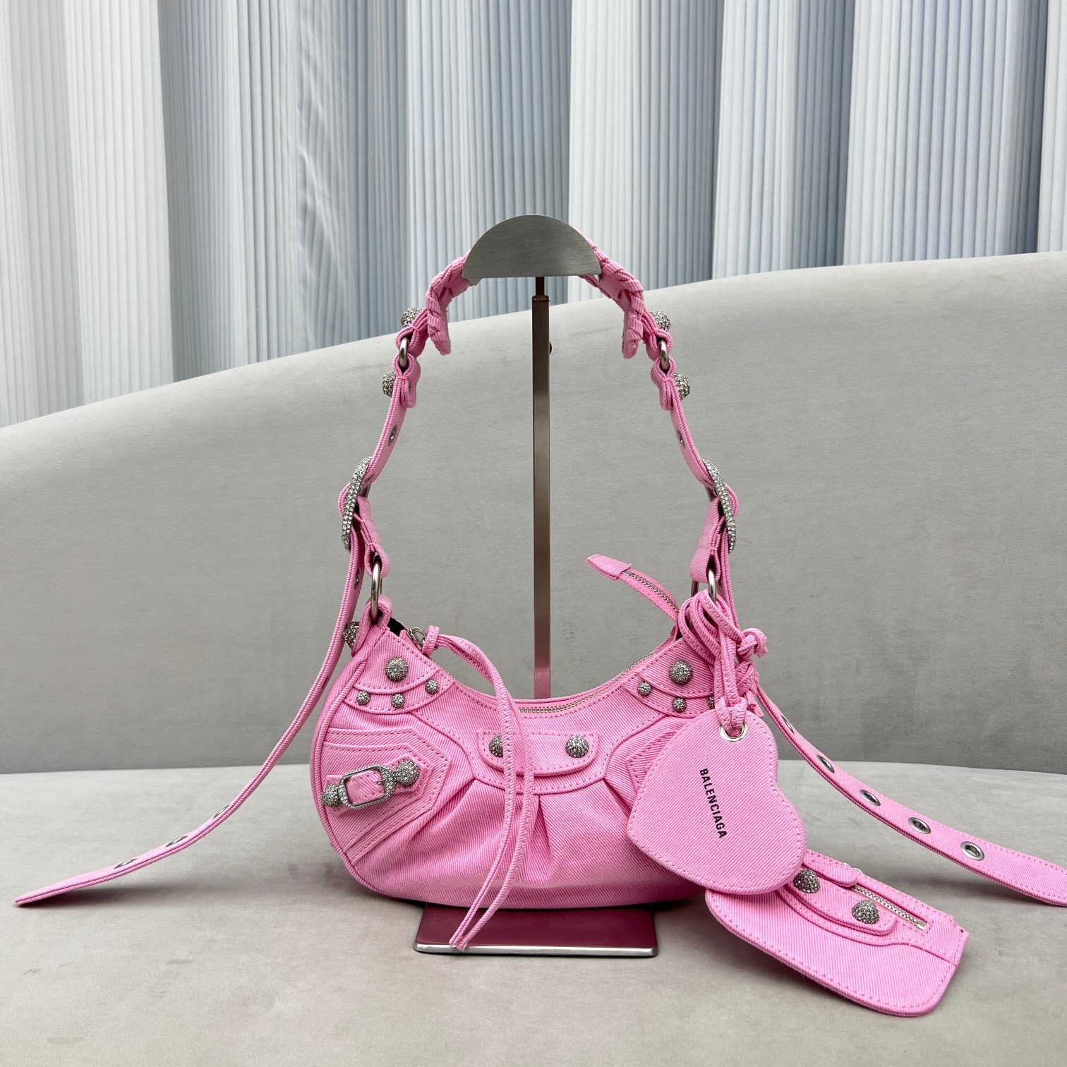 Balenciaga Le Cagole S shoulder bag in fuchsia pink crinkled Arena lambskin with silver-tone hardware