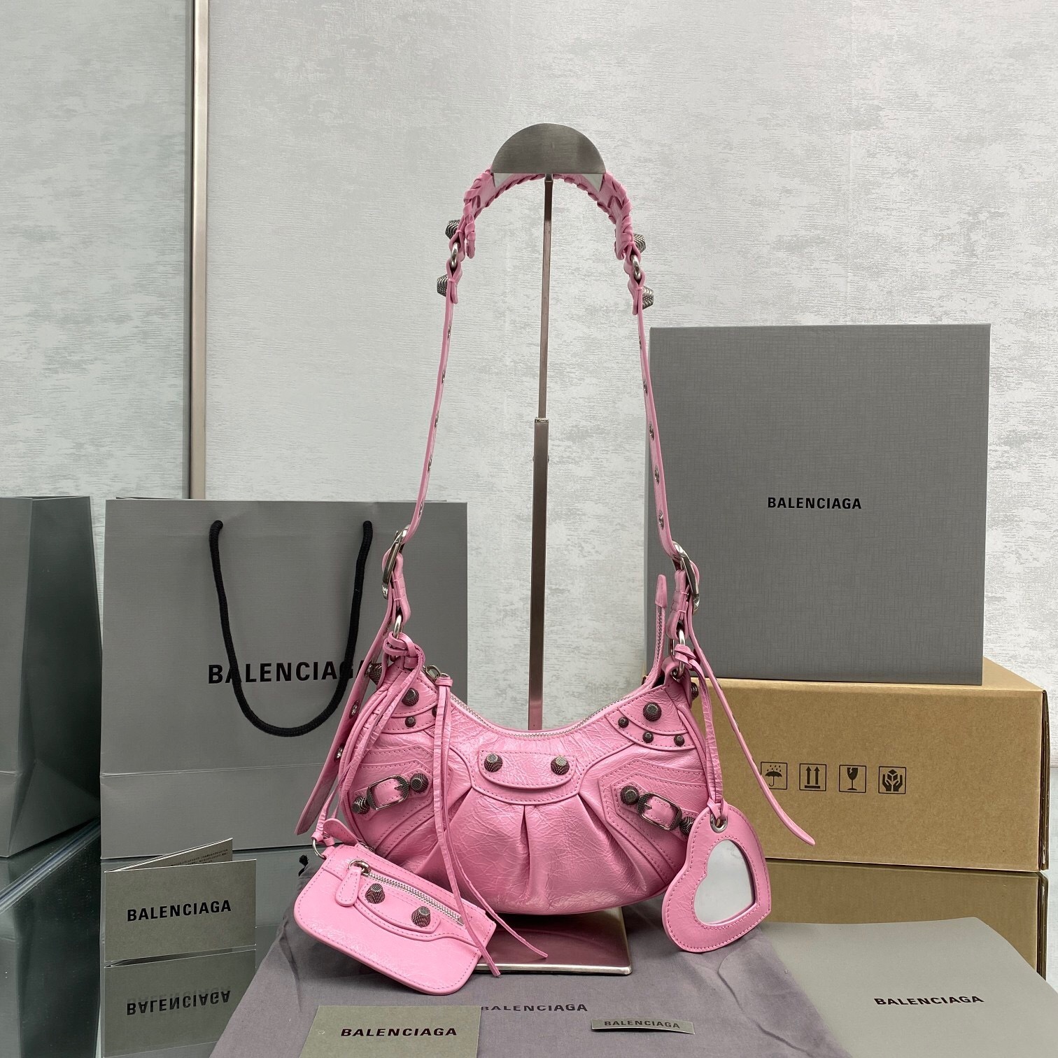 Balenciaga Le Cagole XS shoulder bag in light pink leather